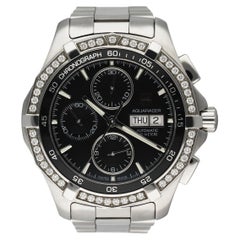 TAG Heuer Aquaracer Day-Date Montre pour homme avec lunette et lunette en diamants, avec boîte et papiers d'origine