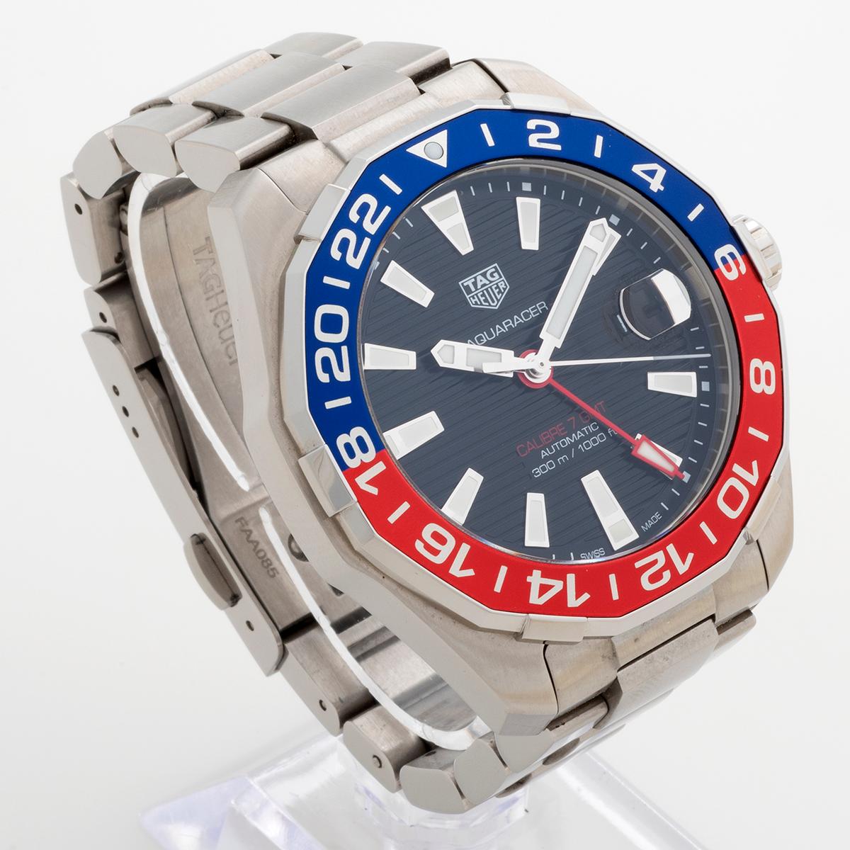 Our Tag Heuer Aquaracer GMT with cal 7 movement, reference WAY201F features a blue/ red bezel 