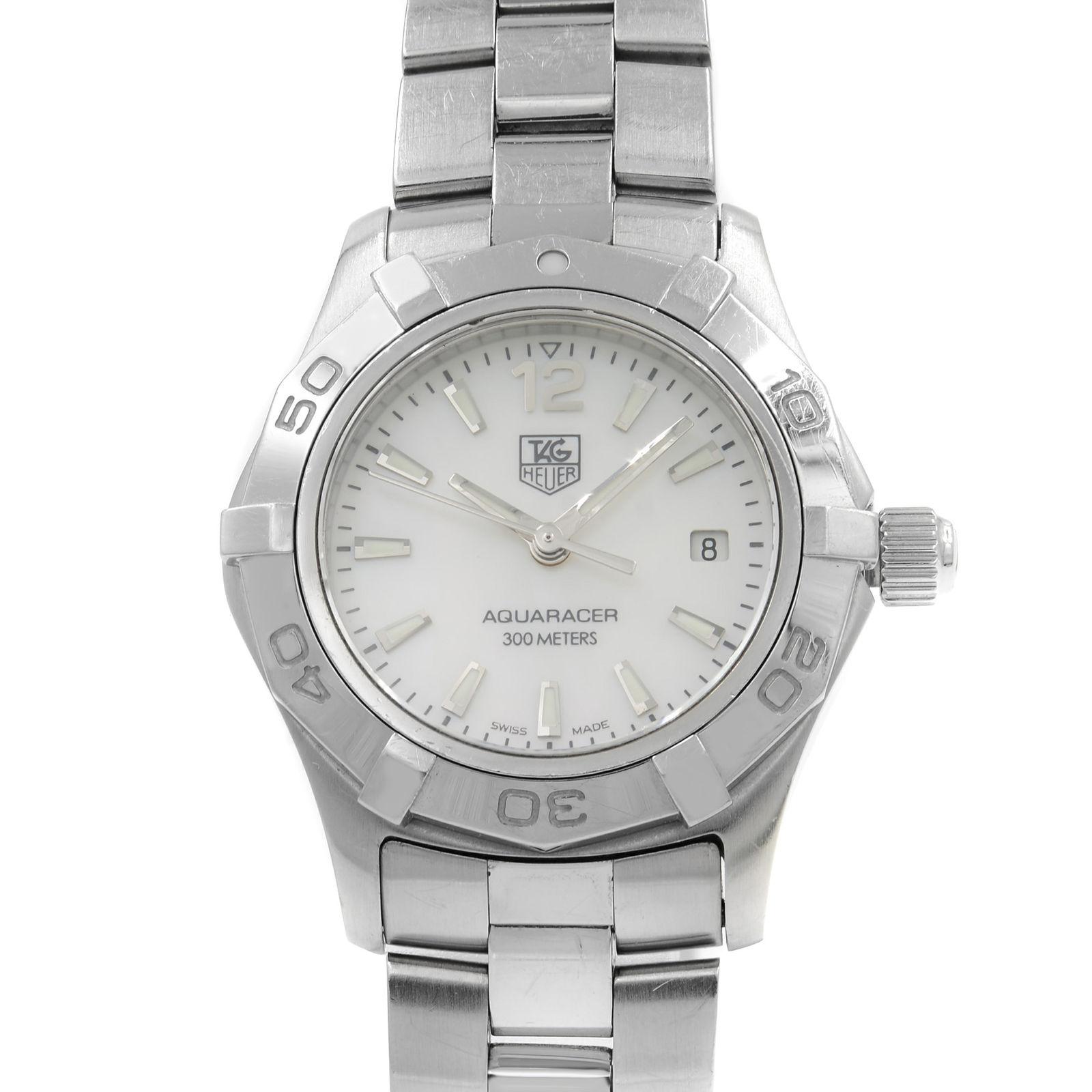 (20723)
This pre-owned TAG Heuer Aquaracer WAF1414.BA0823 is a beautiful Ladies timepiece that is powered by a quartz movement which is cased in a stainless steel case. It has a round shape face, date dial and has hand sticks style markers. It is