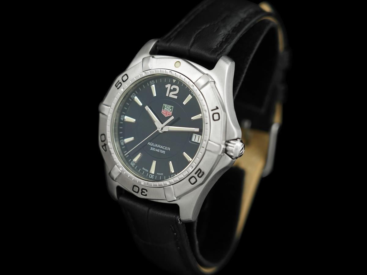 TAG Heuer Aquaracer Ref. WAF1113 Montre de plongée professionnelle 300M - Inox S Excellent état - En vente à Suwanee, GA