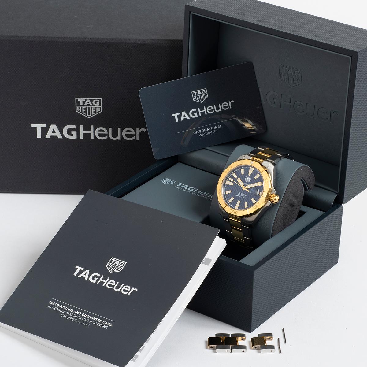Our Tag Heuer Aquaracer reference WBD2120-0 with 41mm gold/steel case and bracelet and blue dial with automatic movement , is presented in outstanding condition with little signs of use from new. A complete set with inner and outer box and