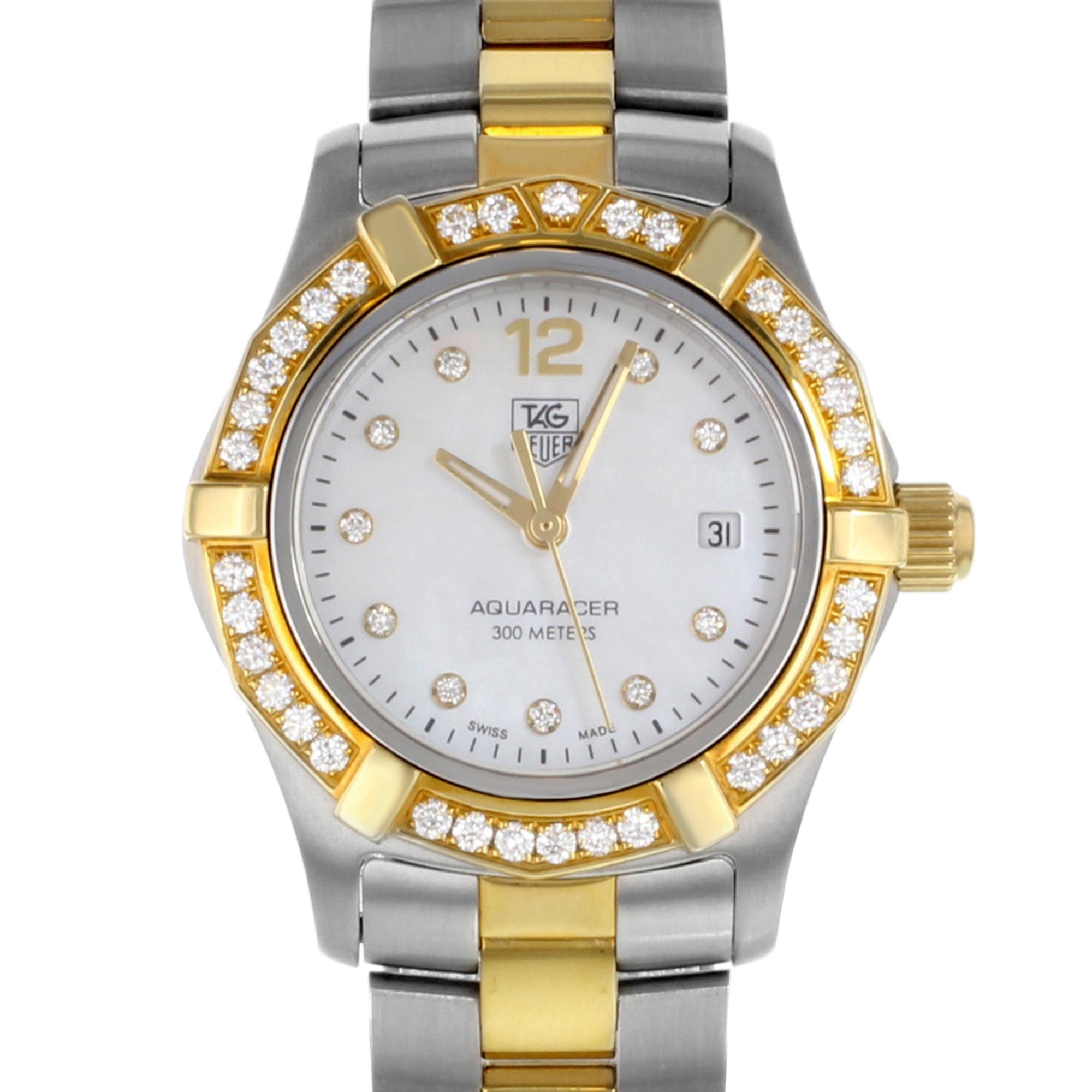 This TAG Heuer Aquaracer is a beautiful ladies' watch. It has never been worn or used. The bezel is an 18K yellow gold set with diamonds (approx. 0.55 total carat weight). Comes with an original box and paper. 

Brand: TAG Heuer  Type: Wristwatch 