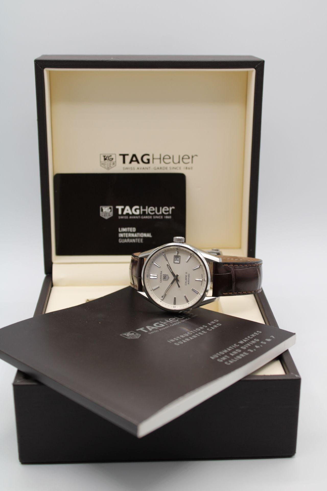 We are delighted to be able to offer this fantastic Tag Heuer Carrera 5 accompanied with its original box, manual and warranty card dated December 2015.

This Tag Heuer, model WAR211B-3, features a stainless steel case measuring 39mm, domed polished
