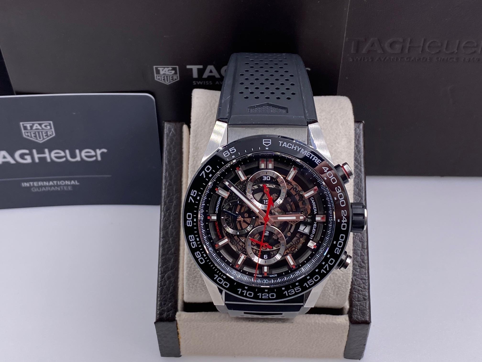 Style Number: CAR2A1Z

 

Model: Carrera Chronograph Heuer 1 

 

Case Material: Titanium and Stainless Steel

 

Band: Rubber

 

Bezel:  Black Titanium Carbide Coated Stainless Steel Bezel 

 

Dial: Black

 

Face: Sapphire Crystal

 

Case Size: