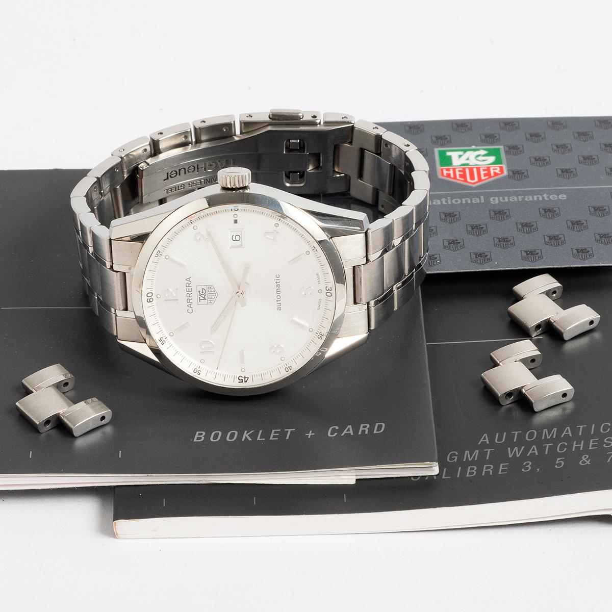 Our Tag Heuer Carrera Date reference WV211A features a stainless steel 38mm case with silver sun ray dial and stainless steel bracelet with folding clasp and exhibition case back, which shows the cal. 5 automatic movement. Presented in excellent