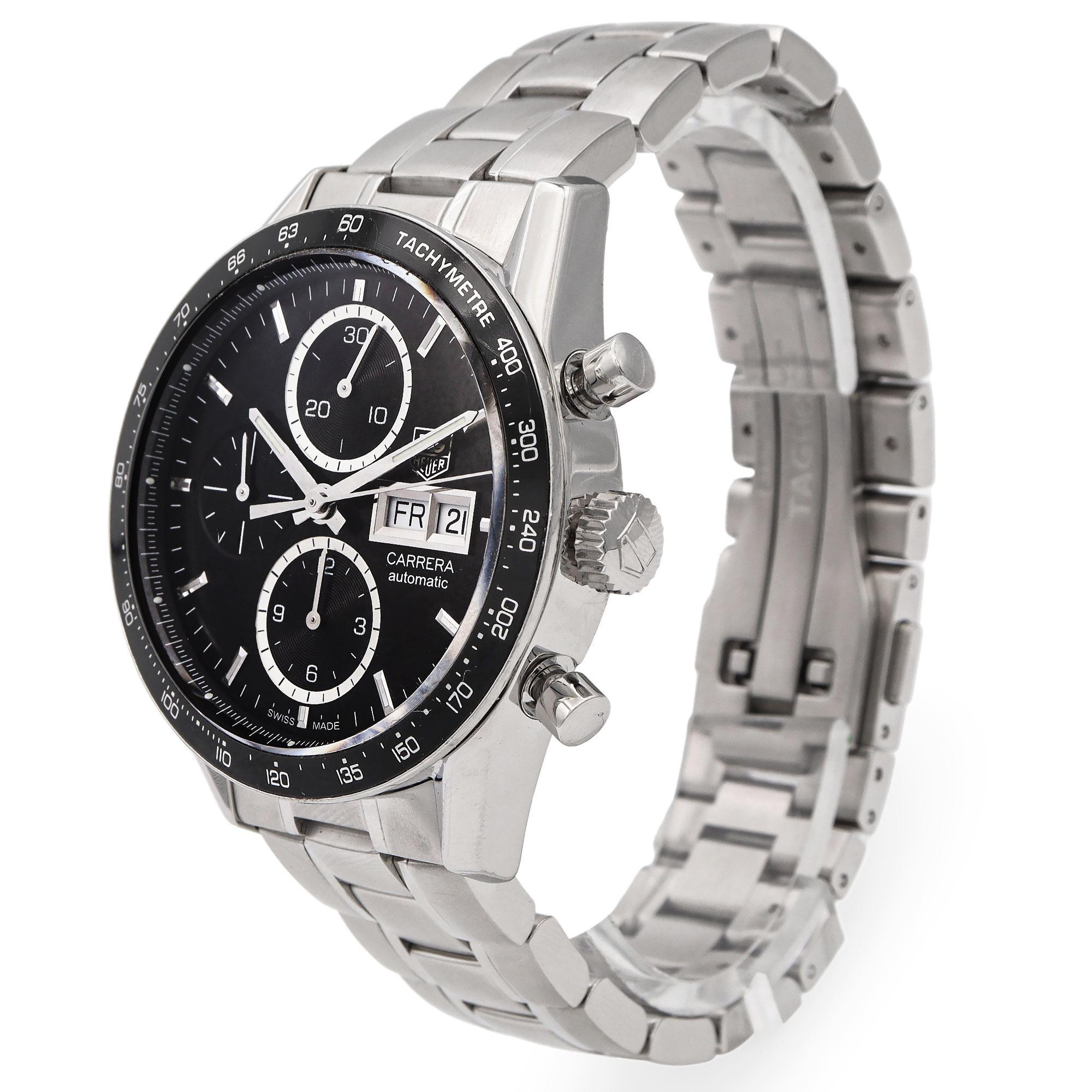 This TAG Heuer Carrera Automatic Chronograph is a bold and refined timepiece, crafted for precision and performance. Featuring a sleek black dial with silver-tone indices and hands, this watch includes three sub-dials for 30-minute, 12-hour, and