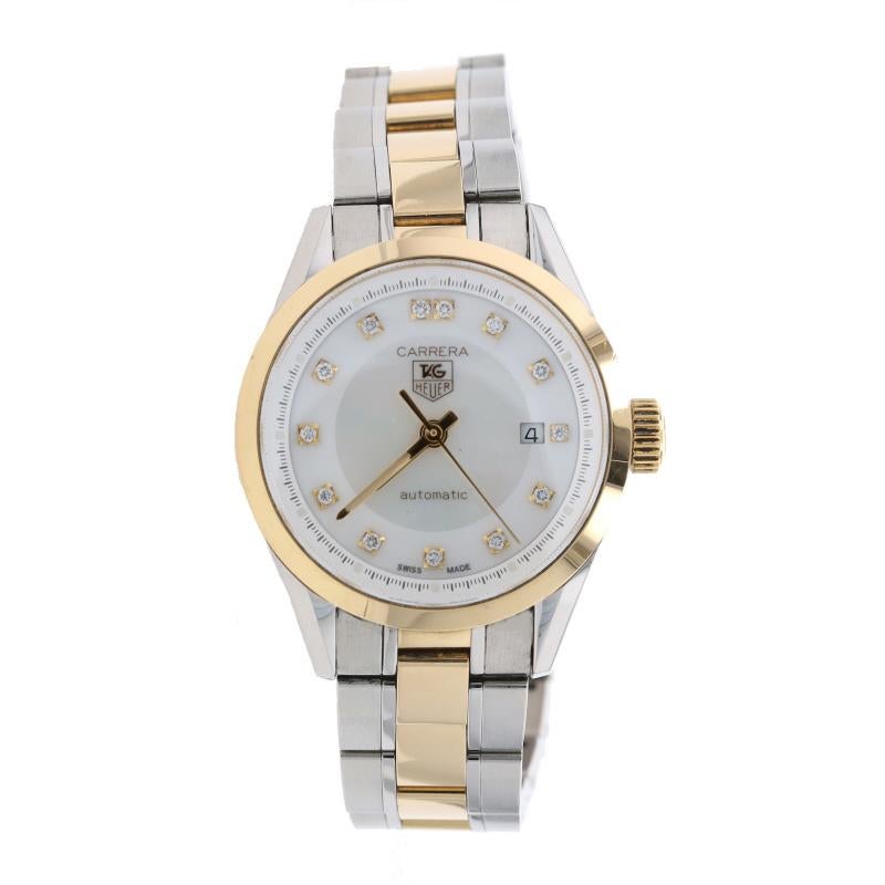 Brand: Tag Heuer
Model: Carrera
Model Number: WV2450.BD0797
Dial Color: White Mother of Pearl & Diamonds
Metal Content: Stainless Steel & 18k Yellow Gold 
Movement: Swiss Automatic
Number of Jewels: 25
Warranty: One-Year

Stone Information
Natural