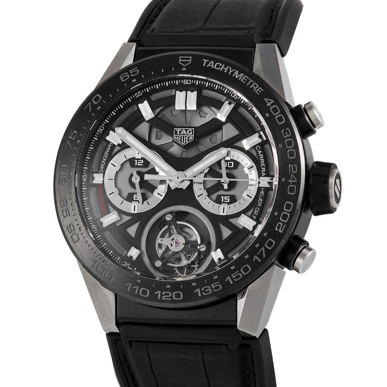 What sets this TAG Heuer Carrera Tourbillon Men's Watch CAR5A8Y.FC6377 is its dial. It showcases a hybrid traditional and openworked dial with an industrial look. The watch also comes with a 45mm titanium case and a black ceramic bezel with a grey