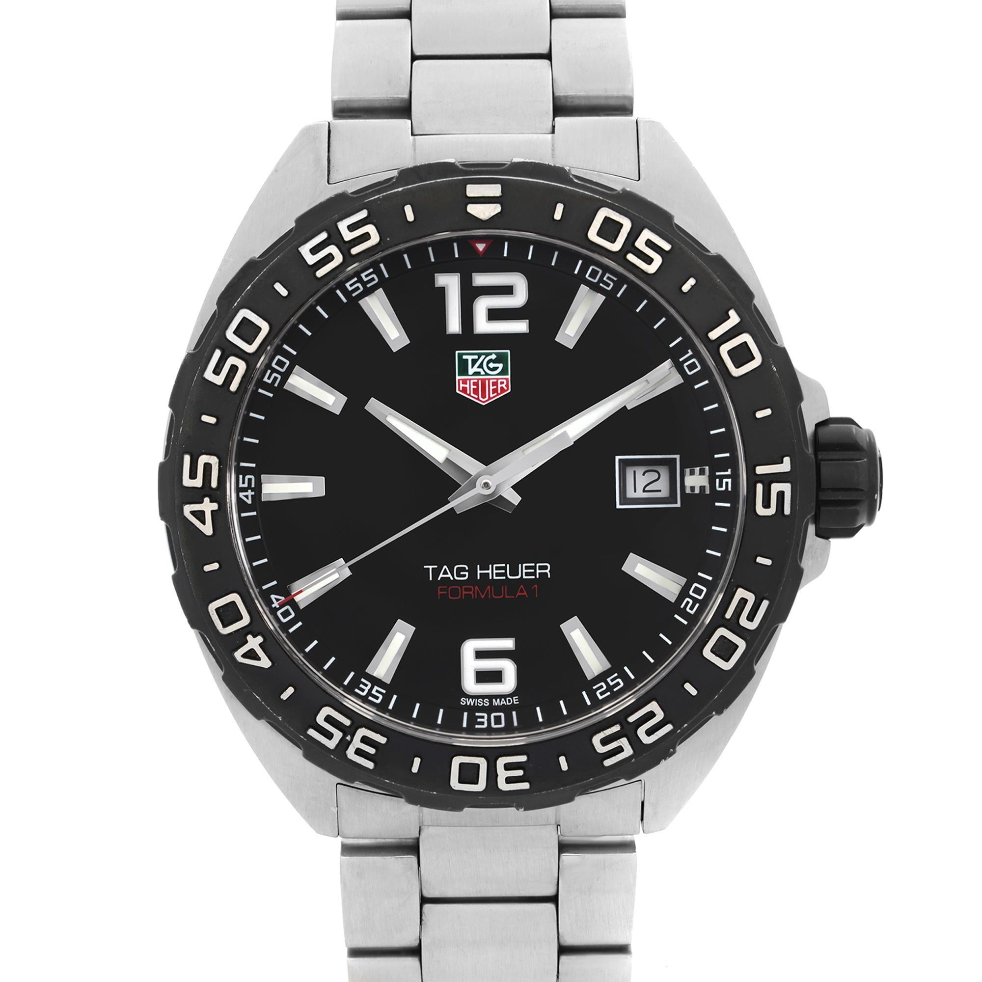 Pre owned Tag Heuer Formula 1 41mm Steel Date Black Dial Men's Quartz Watch WAZ.110.BA08. Minor Nicks and scratches on the Bezel Under Closer Inspection. This Timepiece is Powered by a Quartz Movement and Features: Stainless Steel Case with a