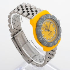 TAG Heuer Formula 1 reference 382.513/1, yellow resin case, rotating bezel, 1989