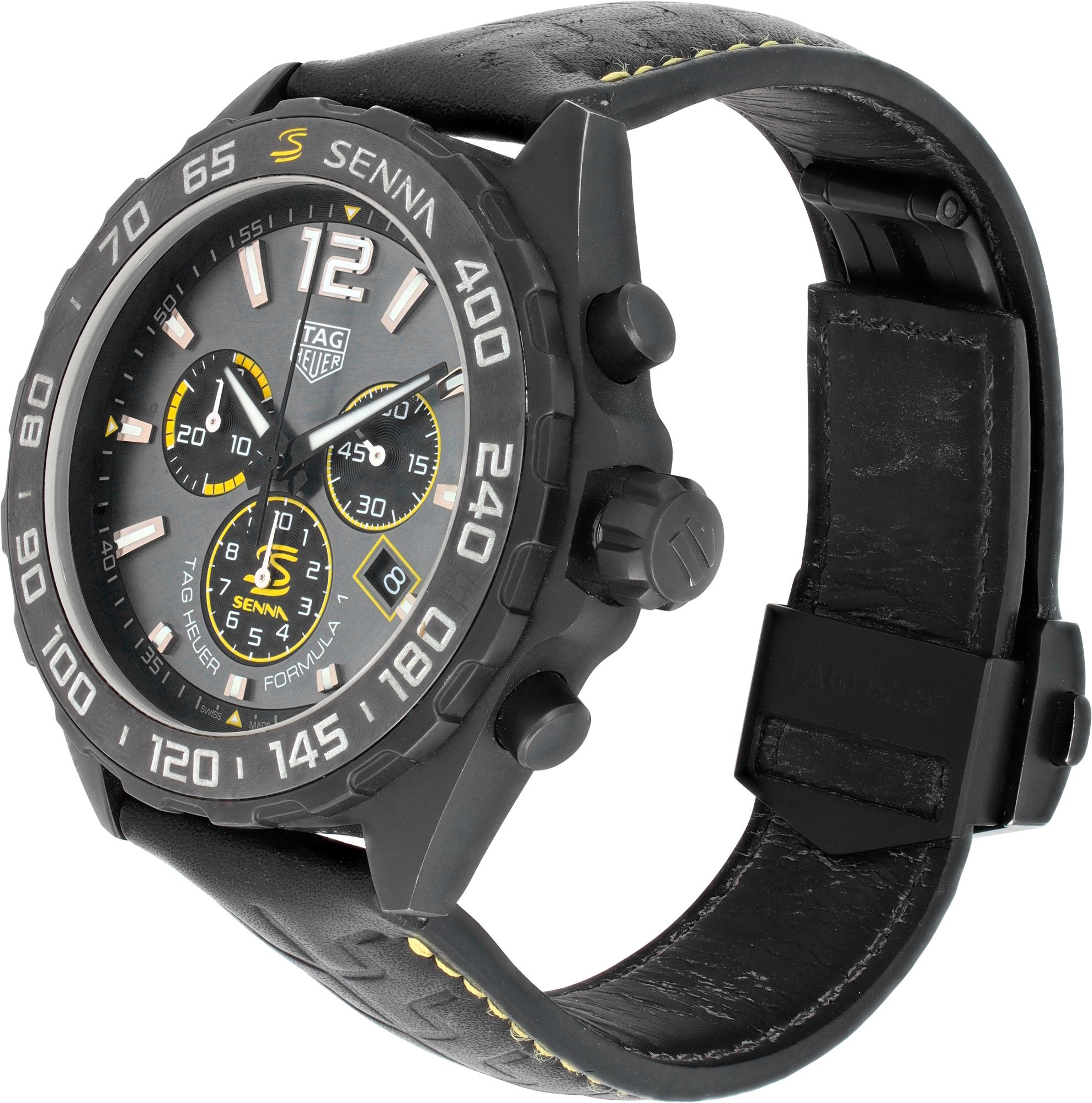 Tag Heuer Formula 1 Senna in dlc steel on black leather strap with yellow stitching. This special edition racing chronograph pays tribute to legendary ambassador Ayrton Senna. Quartz w/ sweep seconds, date and chronograph. 43 mm case size. With