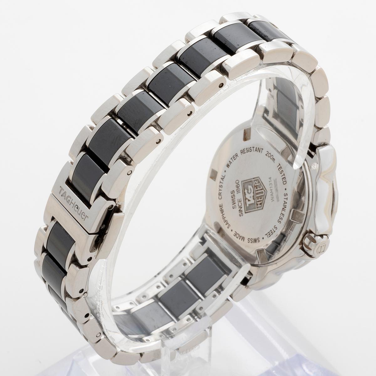 Montre-bracelet Tag Heuer Formula 1 en diamants étincelants. 12 diamants 0,9 carat. Paperasse Unisexe en vente
