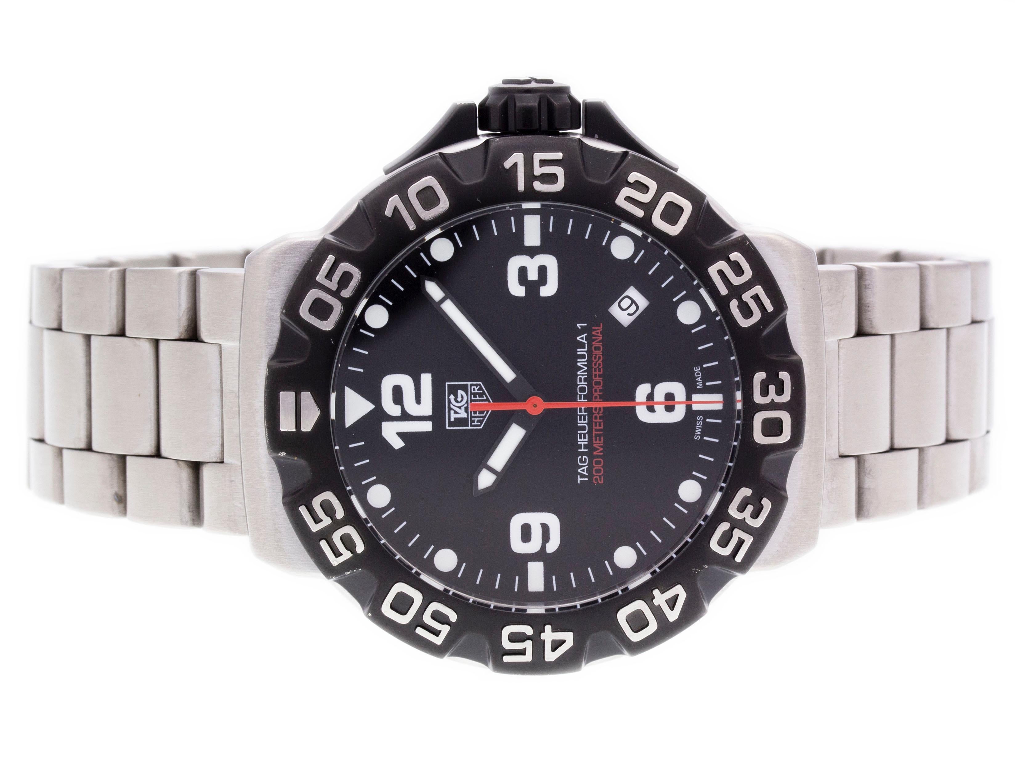 Stainless steel Tag Heuer Formula 1 quartz watch with a 41mm case, black dial, and bracelet with folding clasp. Features include hours, minutes, seconds and date. Comes with a Gift Box and 2 Year Store Warranty.​

Brand	Tag Heuer
Series	Formula