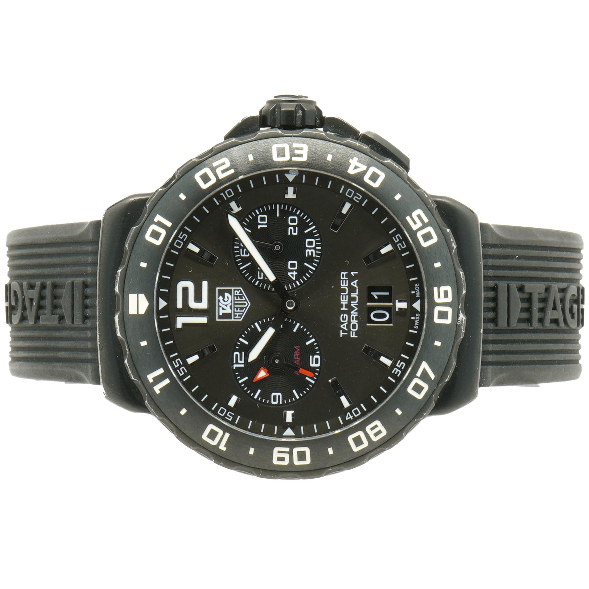 Movement: quartz
Function: hours, minuets, subseconds, date, alarm
Case: 42mm titanium case, 12 hour bezel
Dial: grey
Band: black Tag Heuer rubber
Reference#: WAU111D
Serial#: WRA7XXX

Complete with original box and booklets
Guaranteed authentic by