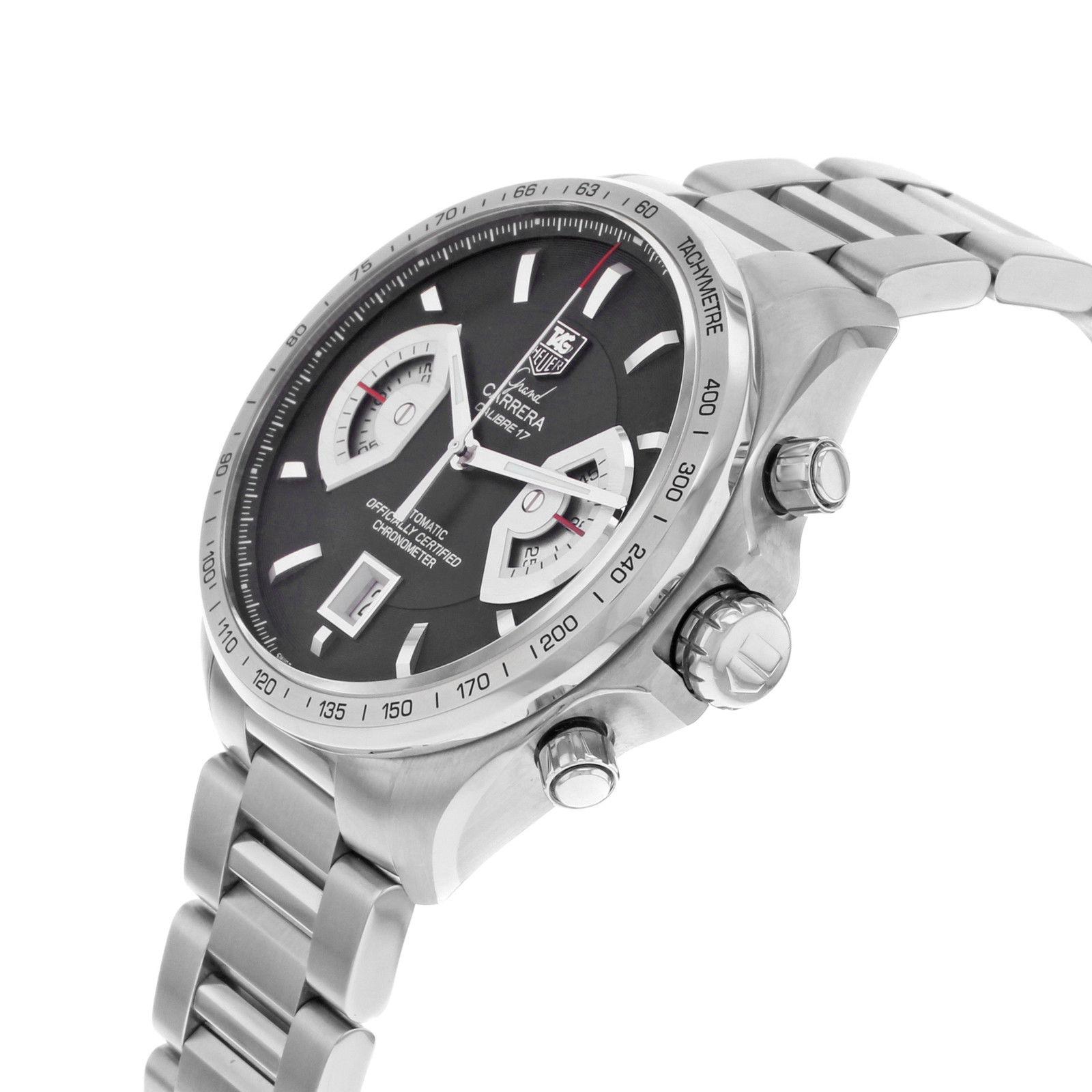 This display model TAG Heuer Grand Carrera CAV511A.BA0902 is a beautiful men's timepiece that is powered by an automatic movement which is cased in a stainless steel case. It has a round shape face, chronograph, date, small seconds subdial dial and