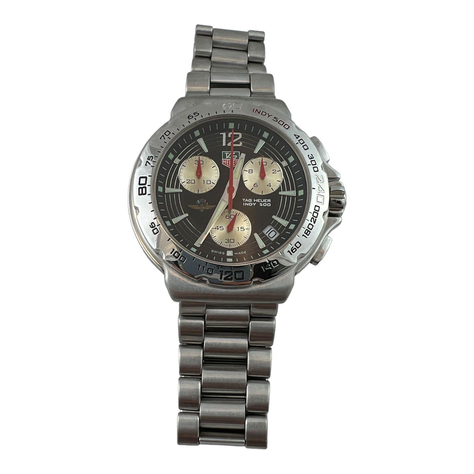 TAG Heuer Indy 500 Formula 1 Watch

Model: CAC111B-0
Serial: NK6094

This classic TAG watch is set in stainless steel

Chronograph with quartz movement.

Black dial 

Stainless steel case is 42mm in diameter

Stainless steel bracelet is in very good