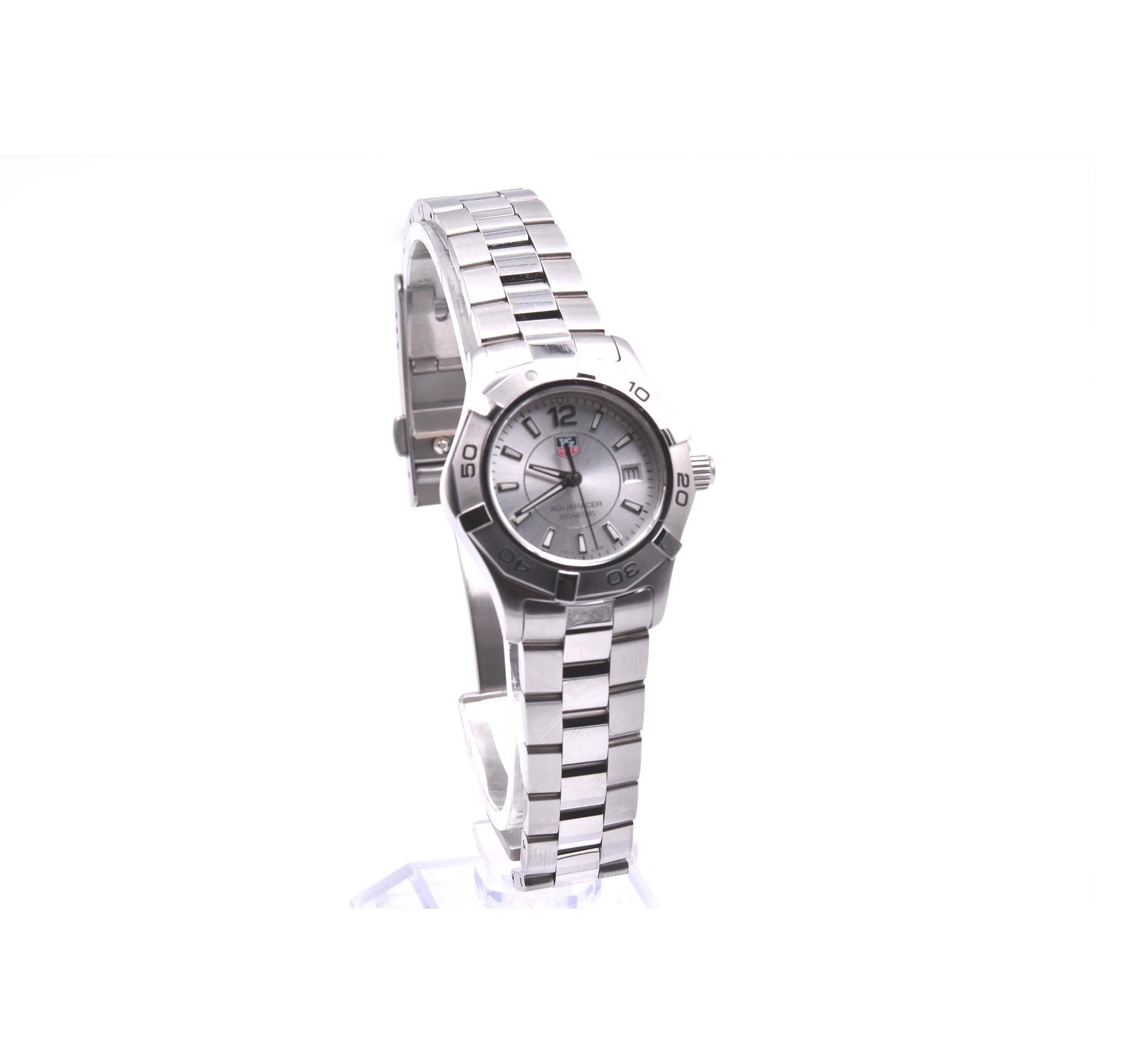 Movement: quartz
Function: hours, minutes, date
Case: 27mm stainless steel case, sapphire crystal, rotating bezel 
Band: stainless steel bracelet with Tag Heuer deployment clasp 
Dial: silver dial, luminous silver hands and silver stick hour