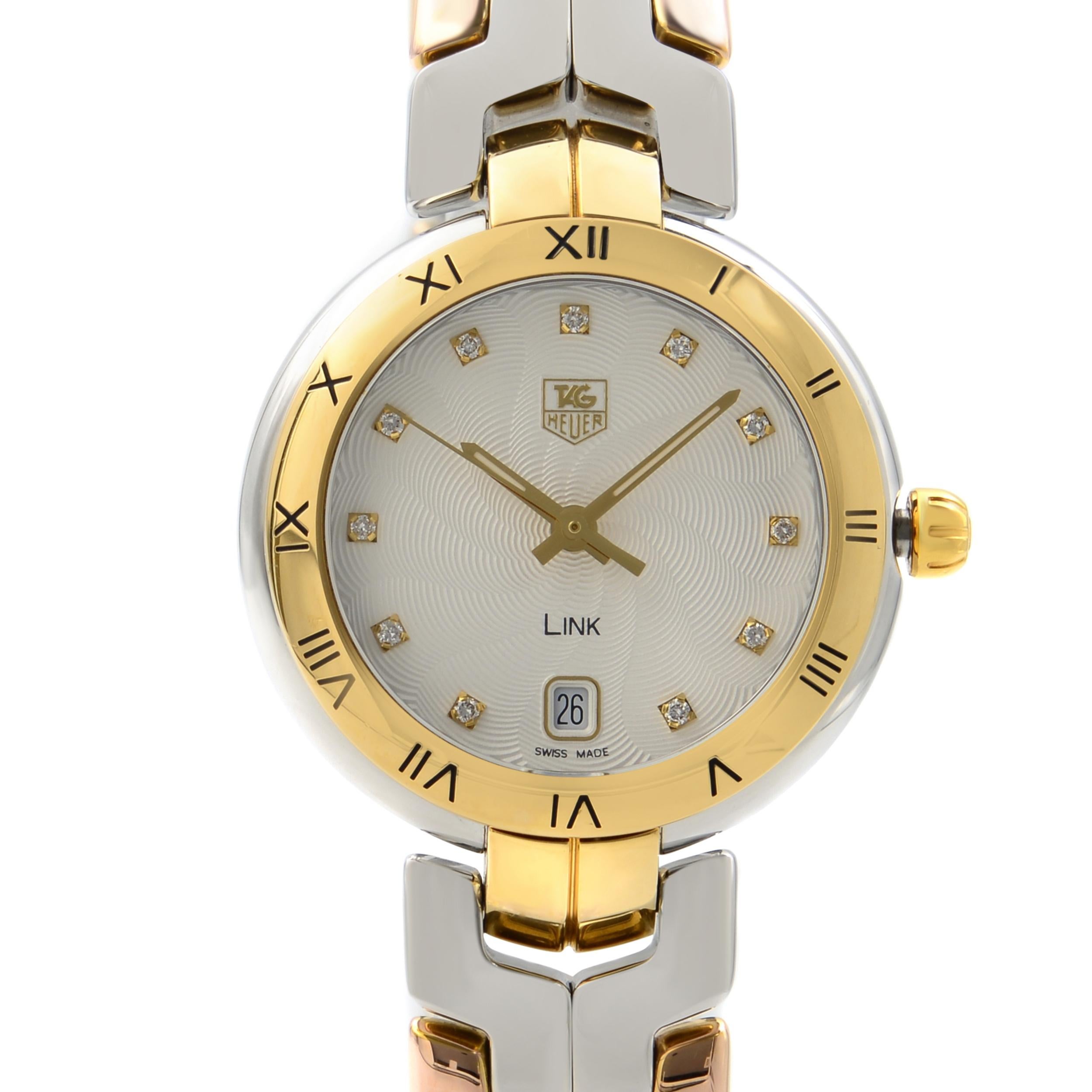 Pre-owned TAG Heuer Link 18K Stainless Steel Silver Dial Ladies Watch WAT1352.BB0962. 18K Yellow Gold and Stainless Steel Case with a 18k Yellow Gold and Stainless Steel Bracelet. Fixed 18k Yellow Gold Bezel. Silver Dial with Gold-Tone Hands and