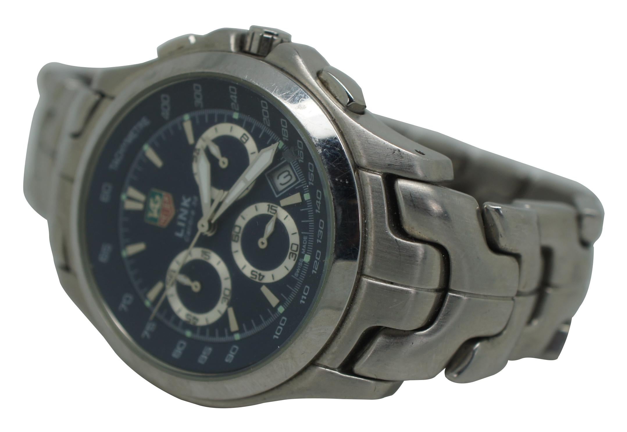 Large TAG Heuer Link Calibre 36 chronograph, tachymetre wrist watch, model CN111B.BA0337, limited edition number 1996/2000, commemorating soccer player Yoshikatsu Kawaguchi.

Band - 8.25” x 0.75” / face – 1.25” (length x width).
 