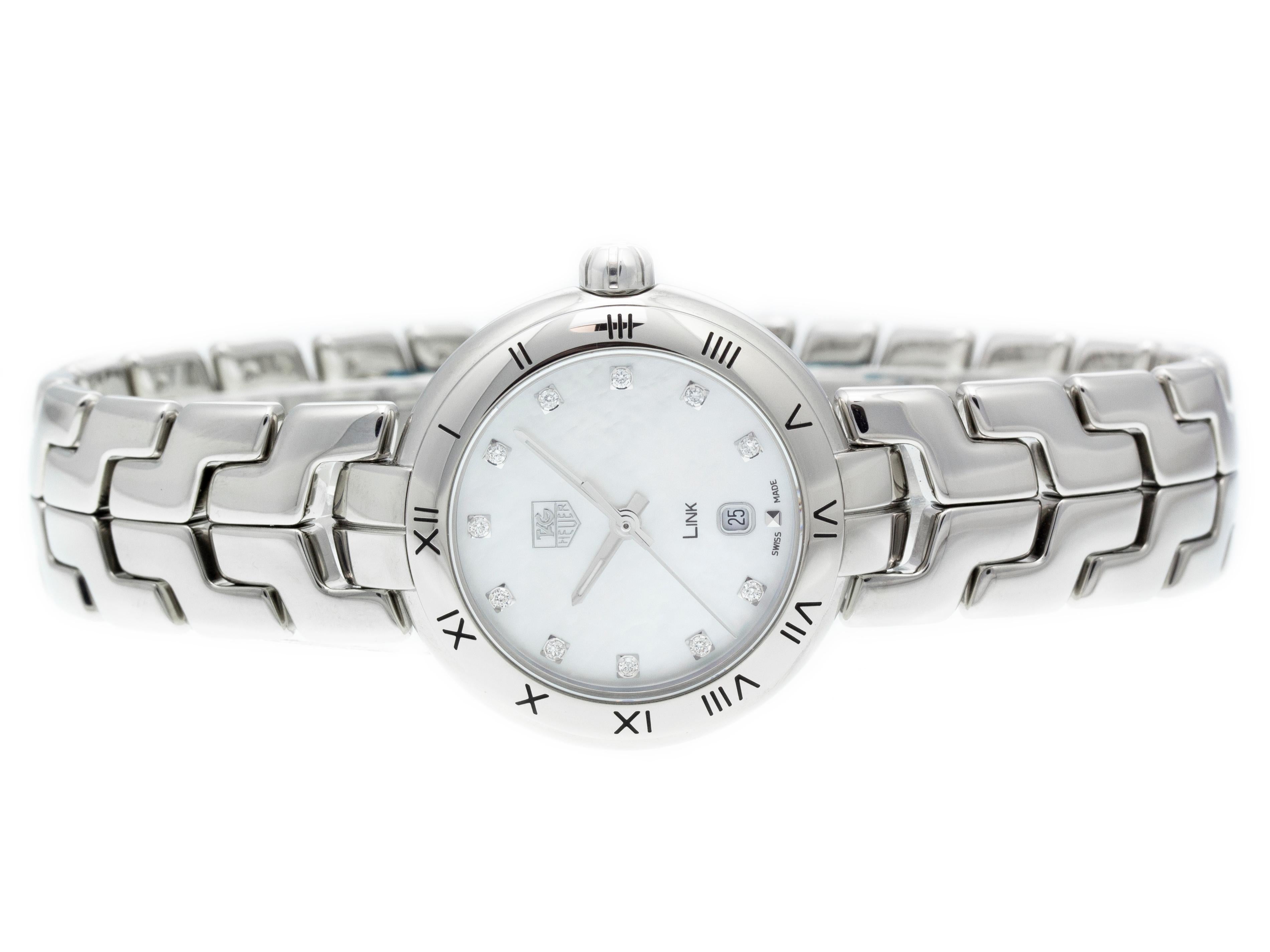 Stainless steel Tag Heuer Link quartz watch with a 29mm case, MOP diamond dial, and bracelet with folding clasp. Features include hours, minutes, seconds, and date. Comes with a Tag Box and 2 Year Store Warranty.​


Brand	Tag