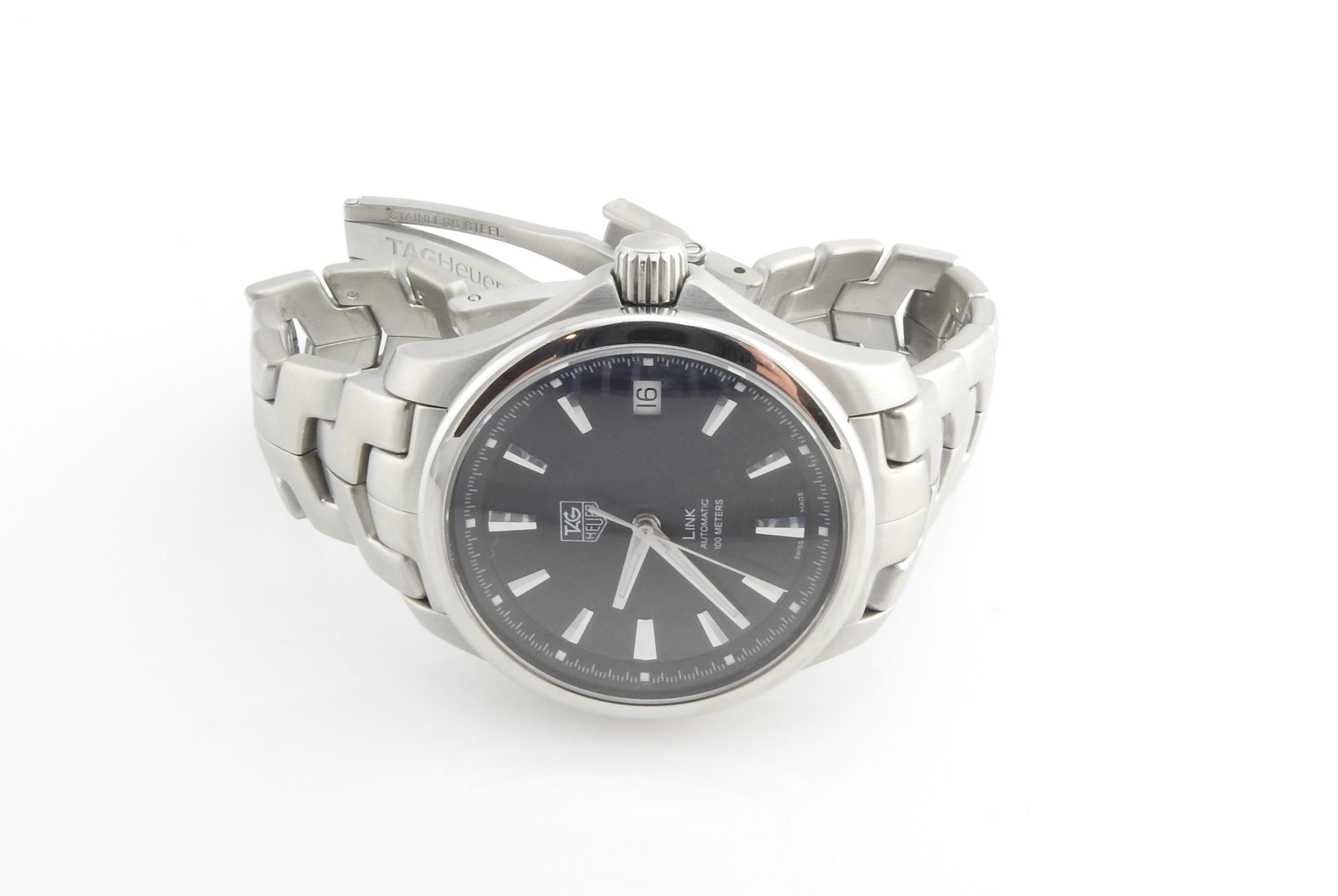 Tag HEUER Link Men's Watch

Model: WJF2210. BAO586
Serial: GL4559

This authentic TAG watch has a stainless steel band and case

Black Dial and silver Markers / Date

Band is approx. 6 1/2