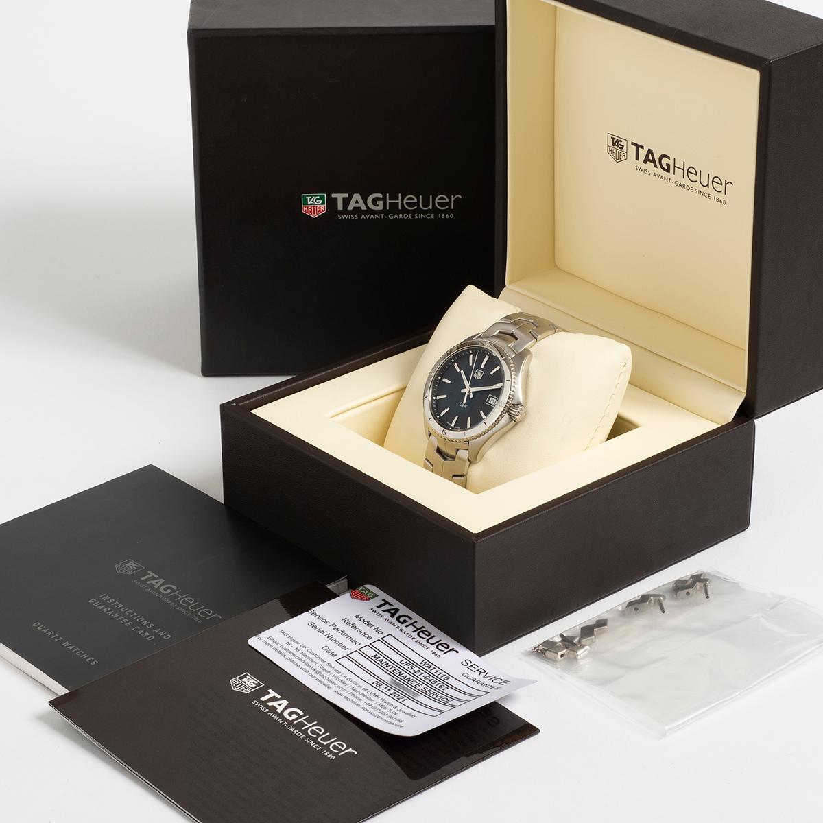 Our attractive Tag Heuer Link reference WAT111-0 features a 40mm stainless steel case with rotating bezel and black dial and stainless steel case. Blending sports and dress elegance, this Link is presented in outstanding condition with only light