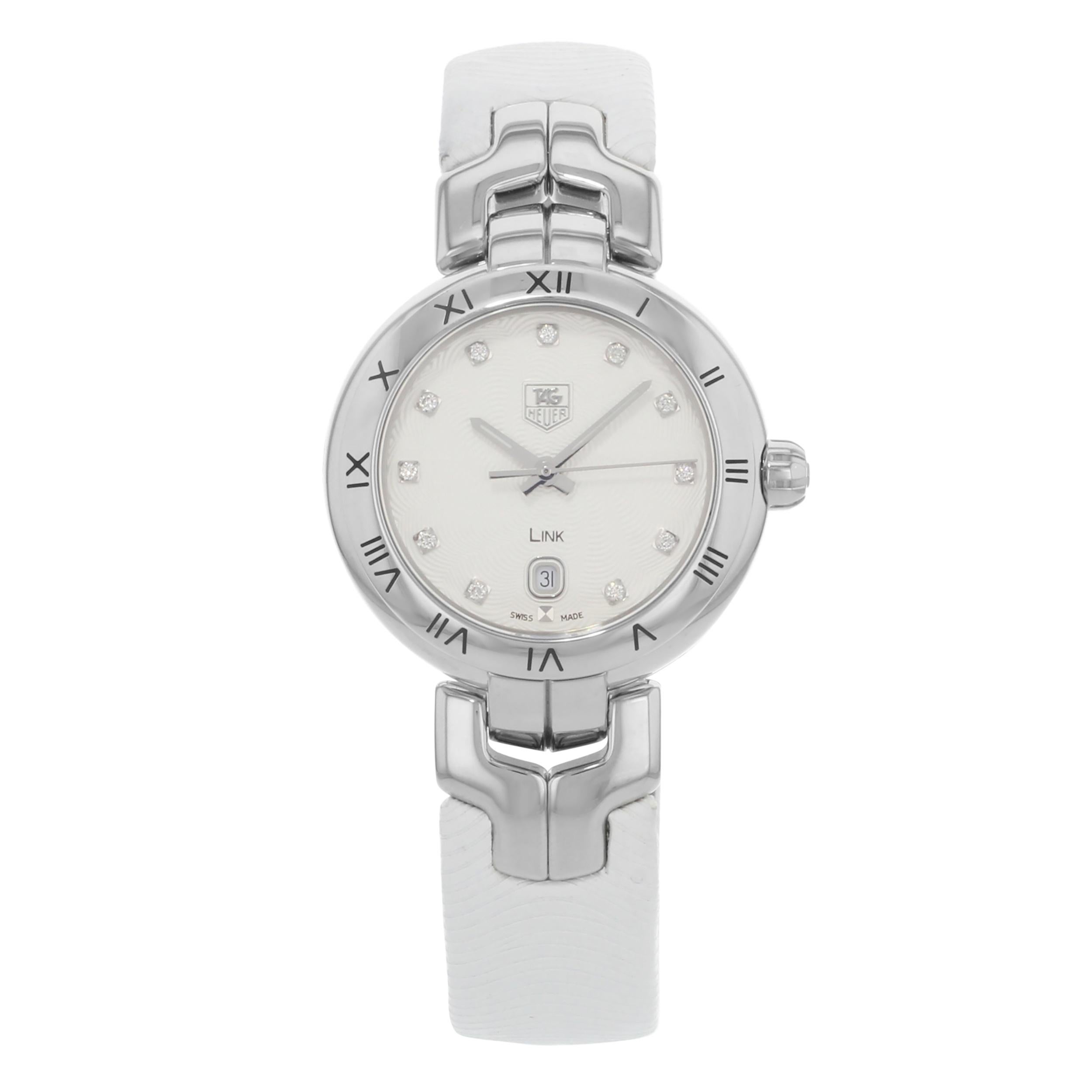 This display model TAG Heuer Link WAT1411.FC6316 is a beautiful Ladies timepiece that is powered by a quartz movement which is cased in a stainless steel case. It has a round shape face, diamonds dial and has hand diamonds style markers. It is
