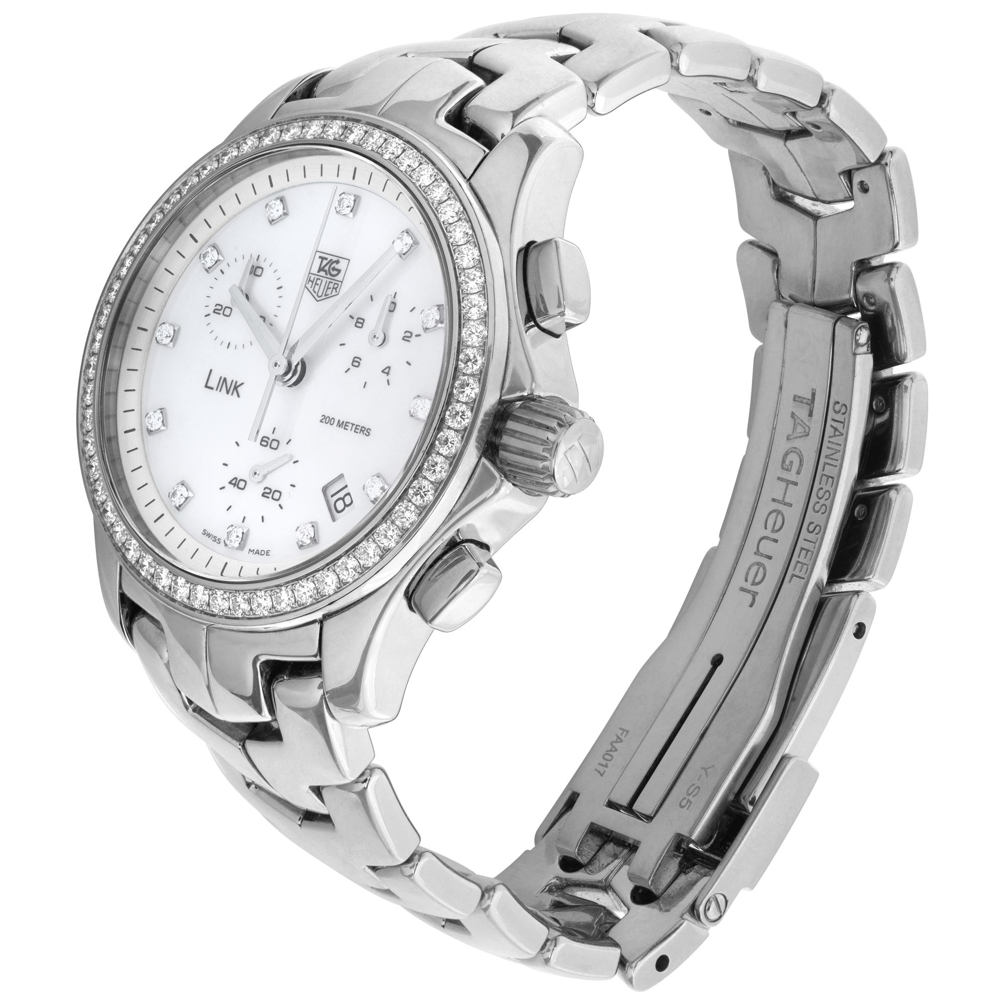 Tag Heuer Link Chronograph in stainless steel with an original diamond mother of pearl dial and diamond bezel. Quartz w/ subseconds, date and chronograph. 33 mm case size. Ref CJF1314. Fine Pre-owned Tag Heuer Watch.

 Certified preowned Sport Tag