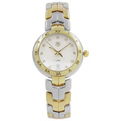 TAG Heuer: Quarzuhr mit Stahlglieder, 18 Karat Gelbgold, Silber Zifferblatt WAT1350.BB0957