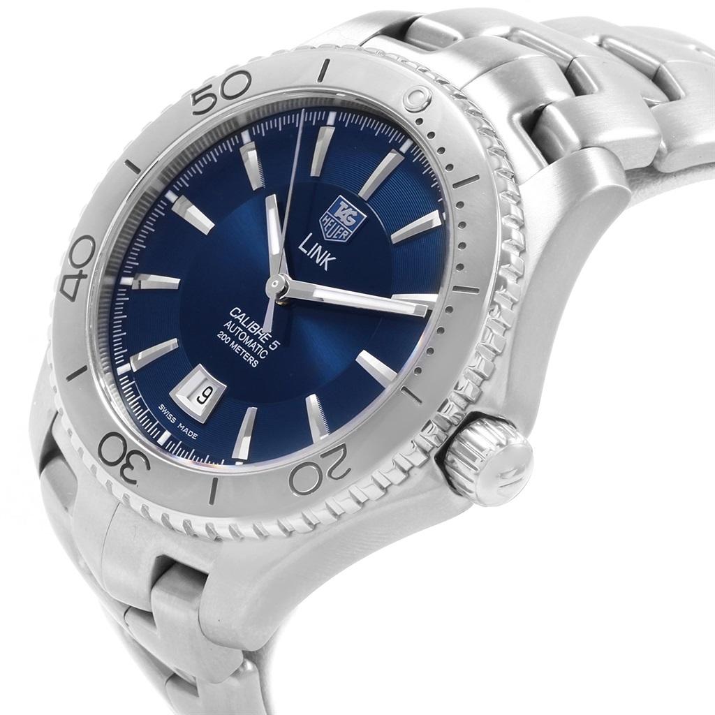 TAG Heuer Link Steel Blue Dial Automatic Mens Watch WJ201C Box Card. Automatic self-winding movement. Stainless steel case 42.0 mm in diameter. Exhibition case back. Fixed stainless steel bezel . Scratch resistant sapphire crystal. Blue dial with