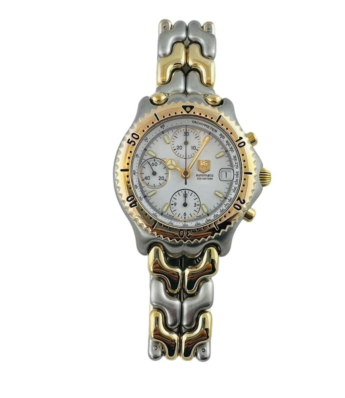 TAG Heuer Two Tone Link Watch

Model: CG2120-RO
Serial: RW2923

This two tone chronograph watch is set in stainless steel with gold accents

White chronograph dial with gold and black markings

Date

Automatic movement

Fits up to 7 3/4