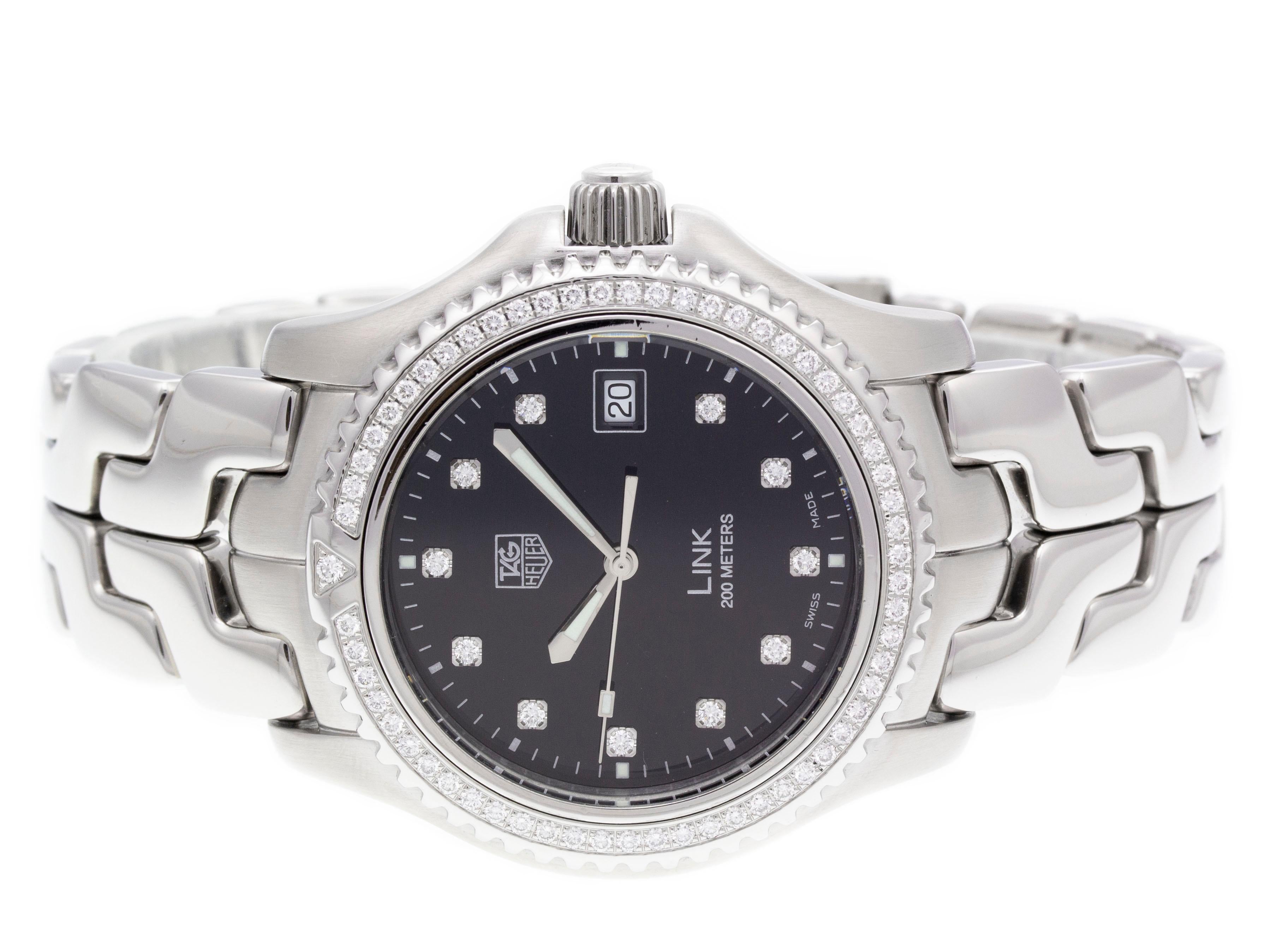 Brand	Tag Heuer
Series	Link
Model	WT111P.BA0550
Gender	Men's
Condition	Great Pre-owned, Tiny Dings on Case & Bezel
Material	Stainless Steel
Finish	Brushed
Caseback	Solid
Diameter	40mm
Thickness	 
Bezel	Fixed Diamond