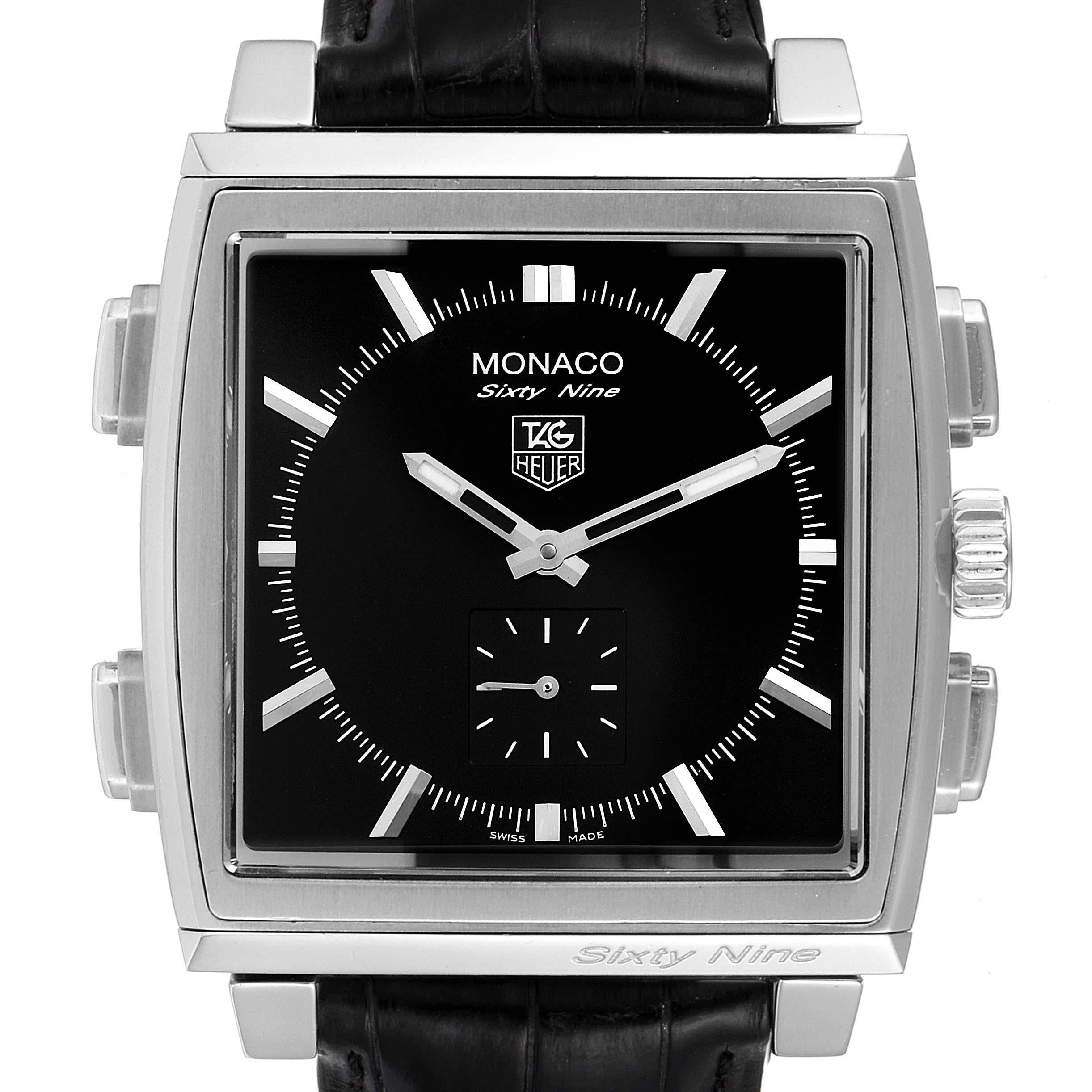 Tag Heuer Monaco Sixty-Nine Steel Analog Digital Flip Mens Watch CW9110. Manual-winding and quartz movement . Features: Time, Date, Alarm Function, 2nd time zone. Stainless steel five-body 40.4 mm rectangular swivel rotating case. Case thickness: