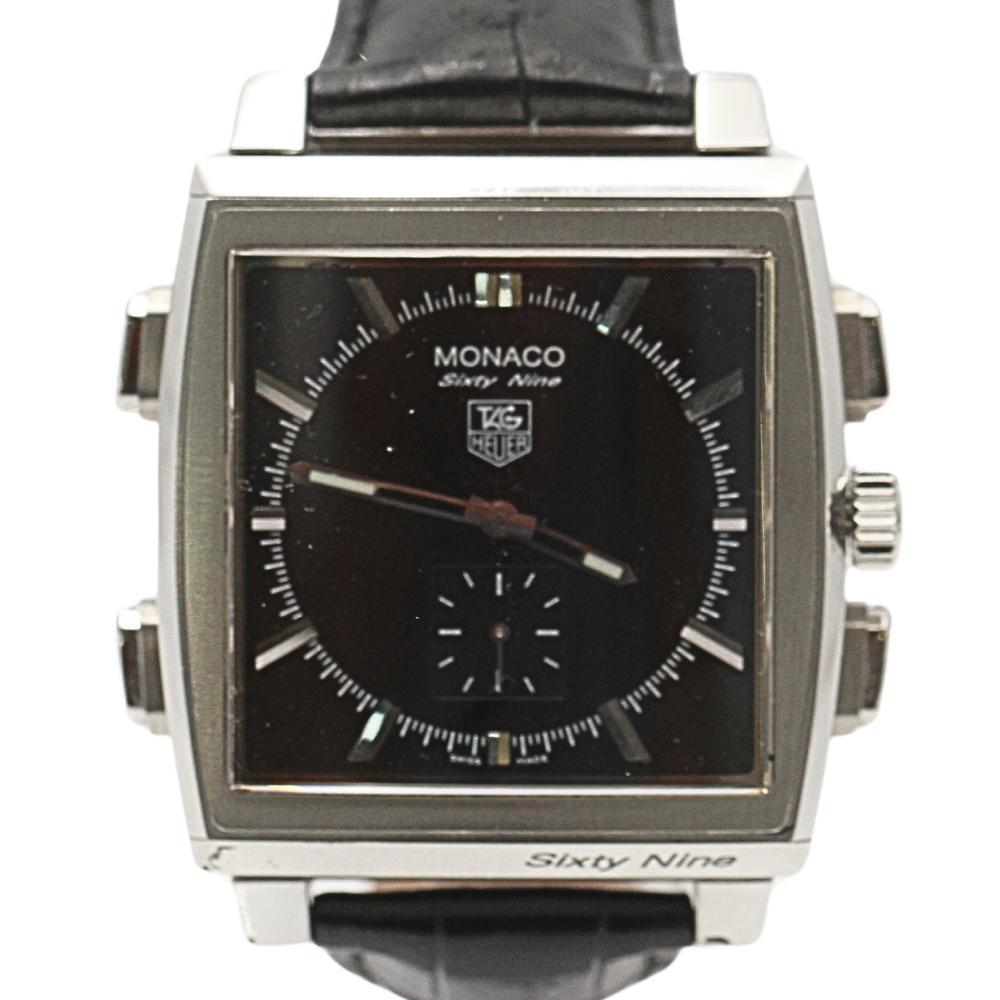 Reloj TAG HEUER MONACO SIXTY NINE de segunda mano Ref: D363467. Reloj reversible de caballero en EXCELENTE estado, con caja de acero de 39 mm excluyendo corona. Analógico por un lado y digital por el otro. Cristal de zafiro. Esfera color negro.