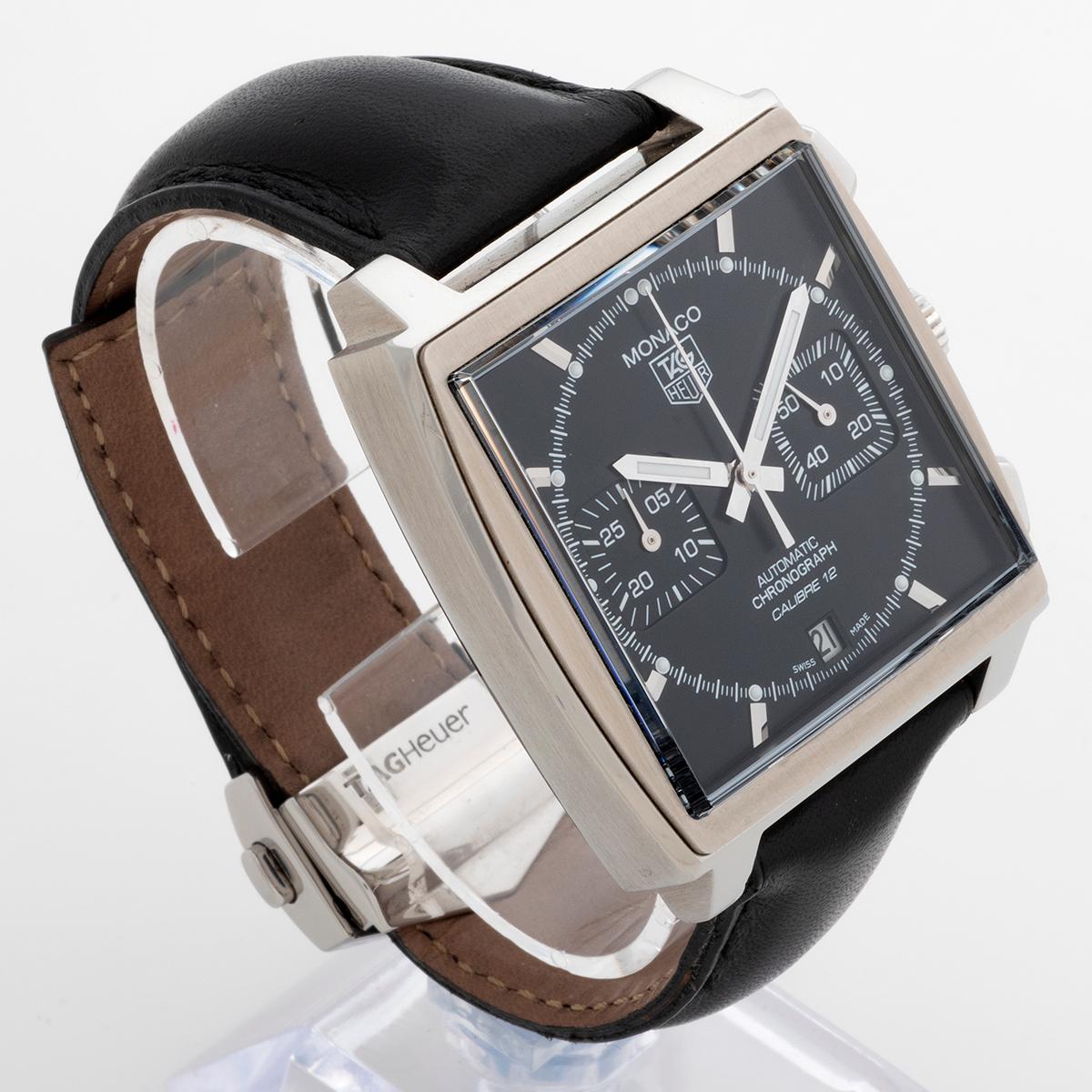Our iconic and collectible Tag Heuer Monaco features a 39mm case, black dial and leather strap with deployant clasp, powered by the cal.12 automatic movement. This example of reference CAW2110 is presented in excellent condition with only light