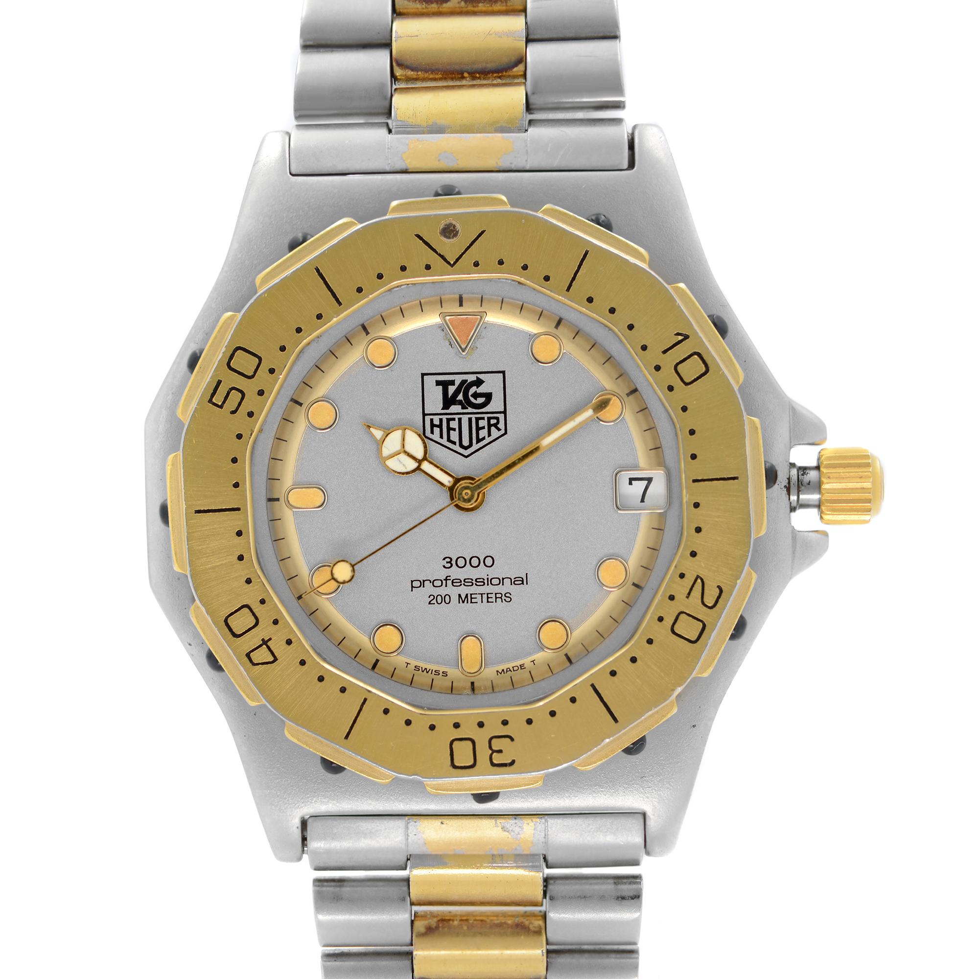 Vintage Pre Owned Tag Heuer Professional 3000 Steel Two-Tone Gray Dial Quartz Men's Watch 934.206.  This Beautiful Timepiece is Powered by Quartz (Battery) Movement and Features Round Stainless Steel Case with a Stainless Steel & Yellow Gold Plated