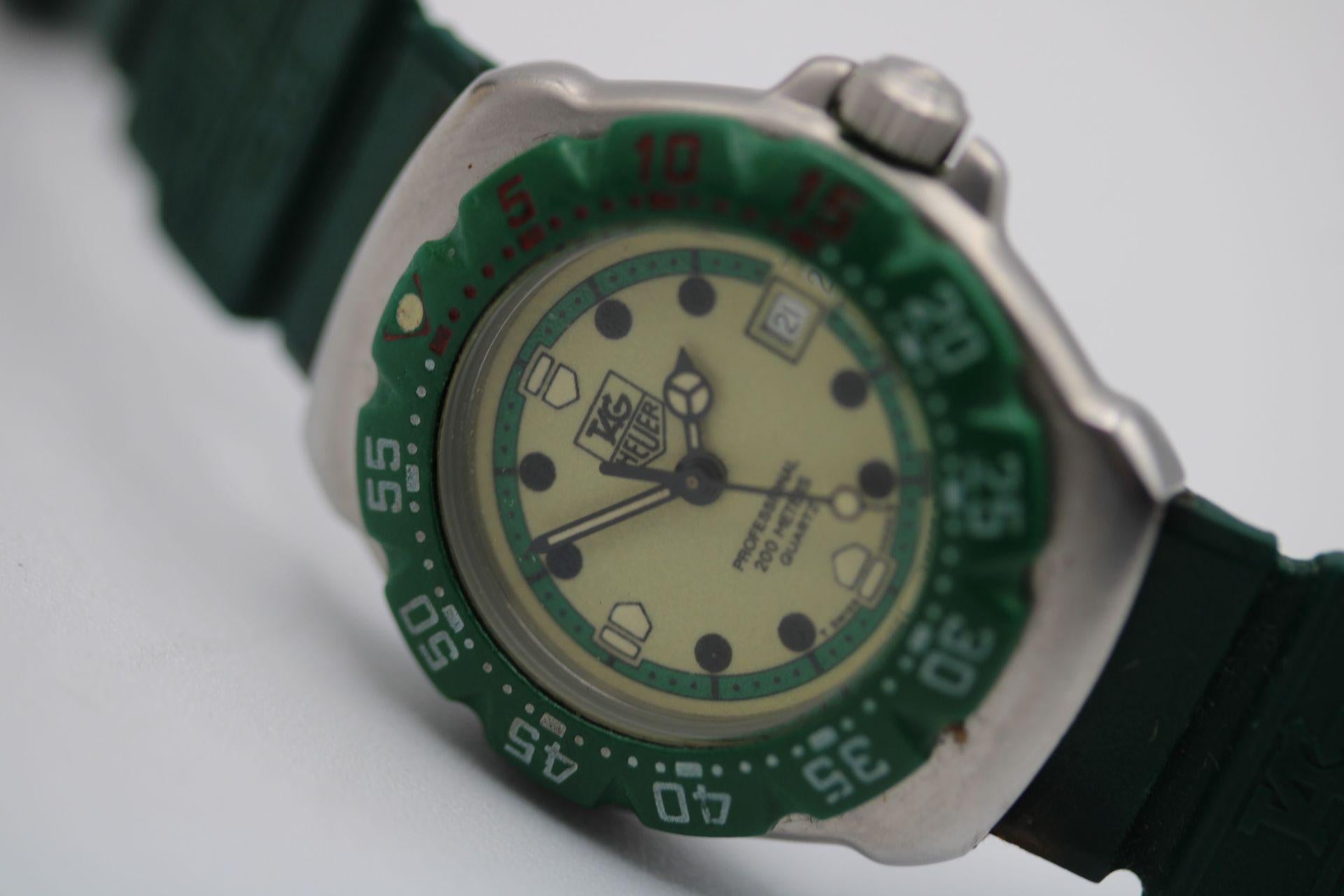Just had a complete check up in our workshop and ready to meets its new owner. Presented in very good condition in addition to our 12-month warranty.

This Ladies Tag Heuer Professional, model WA1412, features a 29mm stainless steel case, green
