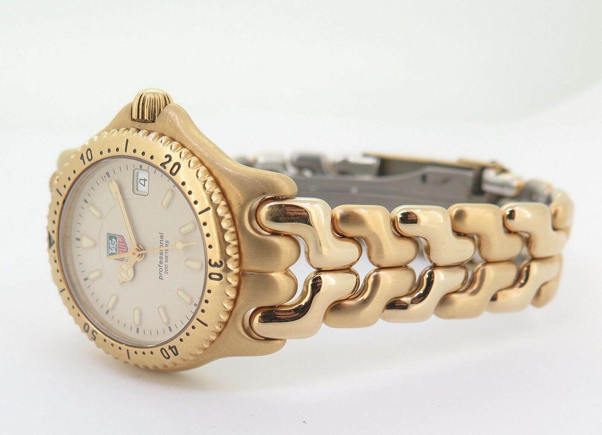 A spectacular gold tone women's watch by Tag Heuer with white hands and white markers. Date window at 3:00. Water resistant 200 M tested. Includes a fold over buckle and sapphire crystal. Swiss made.

Serial # 069215
Ref # WG-1330-0