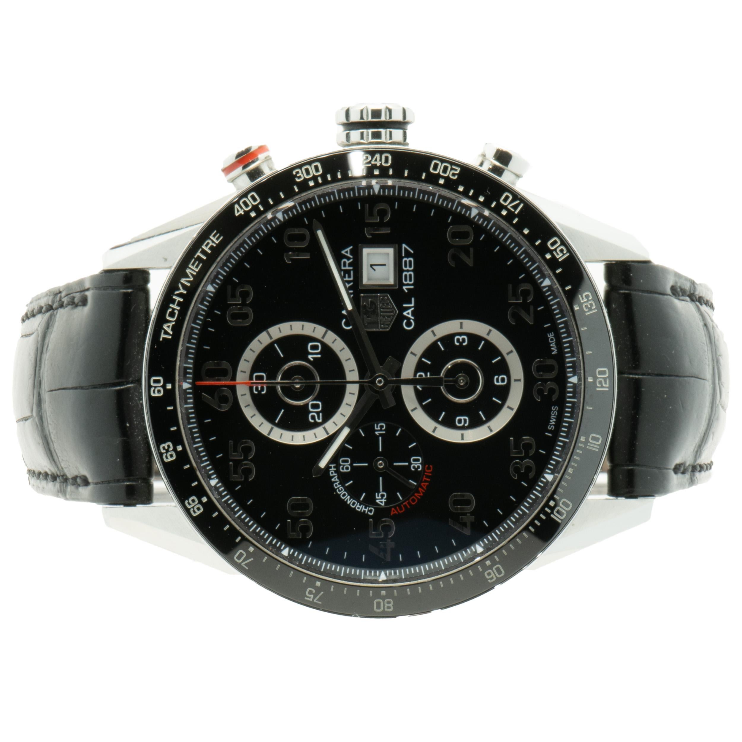 Movement: automatic
Function: hours, minutes, seconds, date, chronograph, tachymeter
Case: 43mm round stainless steel case
Dial: black arabic, 60-second, 30-minute, & 12-hour sub dials
Band: Tag Heuer black leather strap, deployment