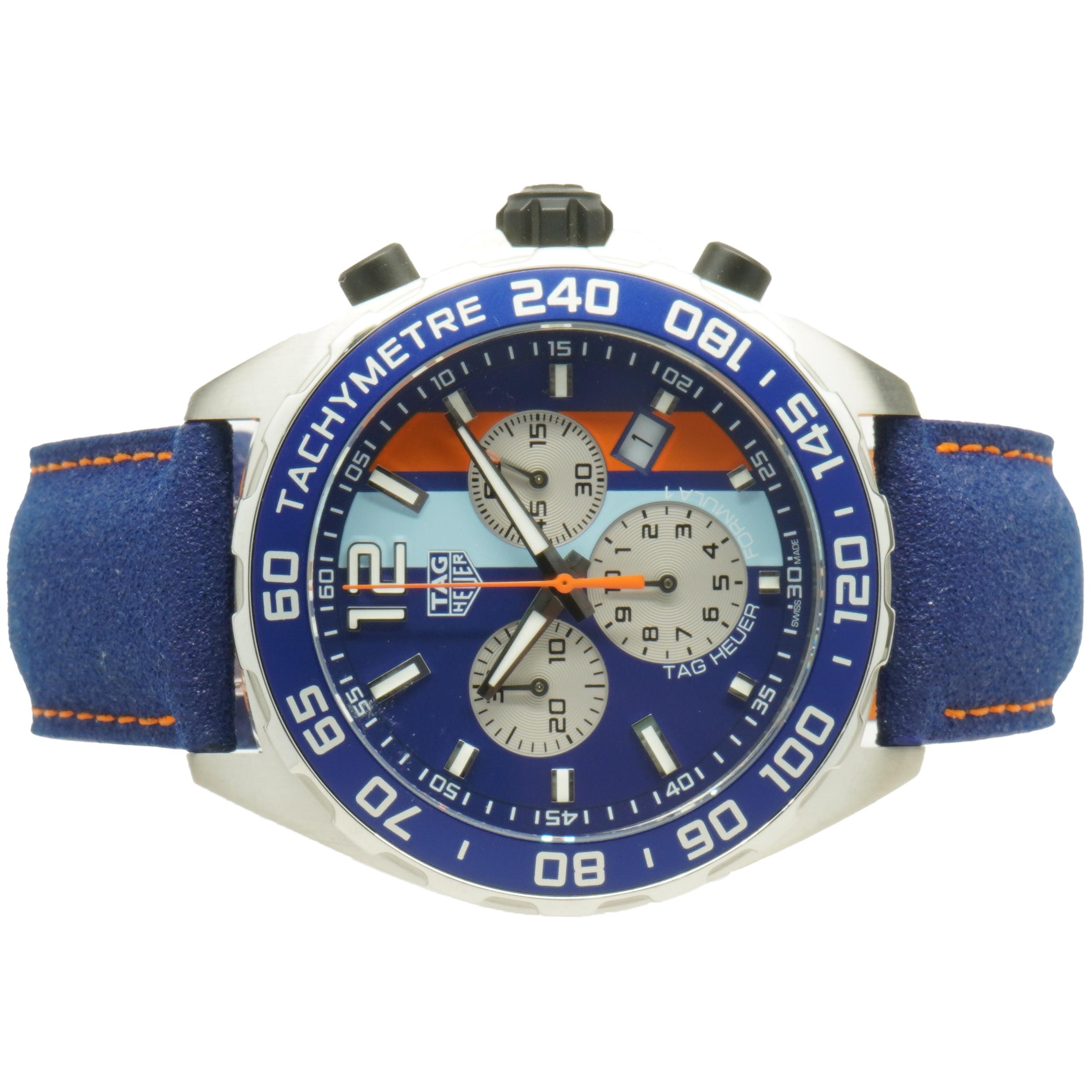 Movement: quartz
Function: hours, minuets, seconds, date, chronograph
Case: 43mm stainless steel, tachymeter bezel
Dial: Steve McQueen blue-orange
Band: blue leather strap, buckle
Reference#: CAZ101N
Serial#: BRG3XXX

Complete with original box and