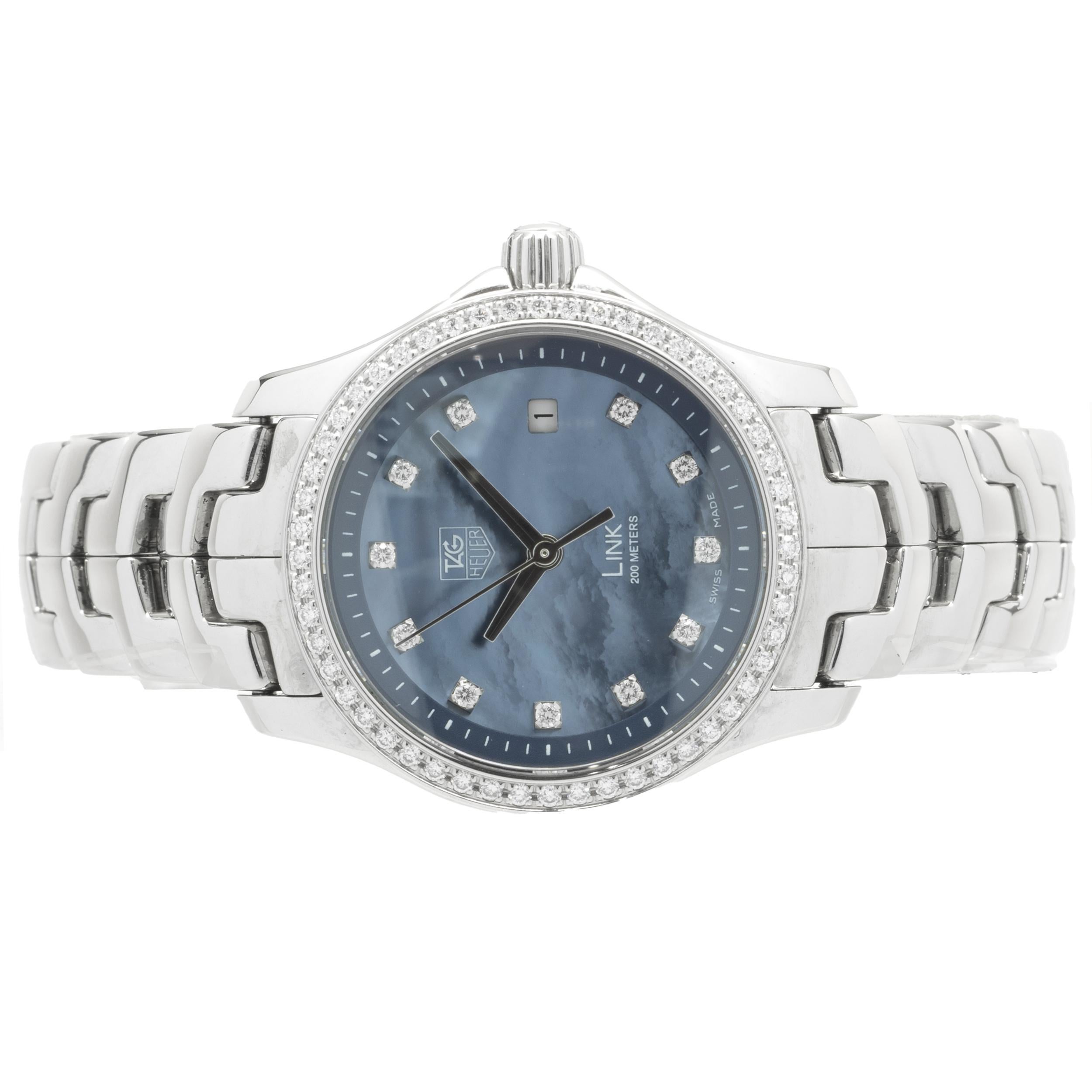 Movement: automatic
Function: hours, minutes, seconds, date, chronograph
Case: 27mm round case with diamond bezel
Dial: black mother of pearl diamond dial
Band: Tag Heuer stainless steel Link bracelet
Reference#: WJF131G
Serial #: YL2XXX

Complete