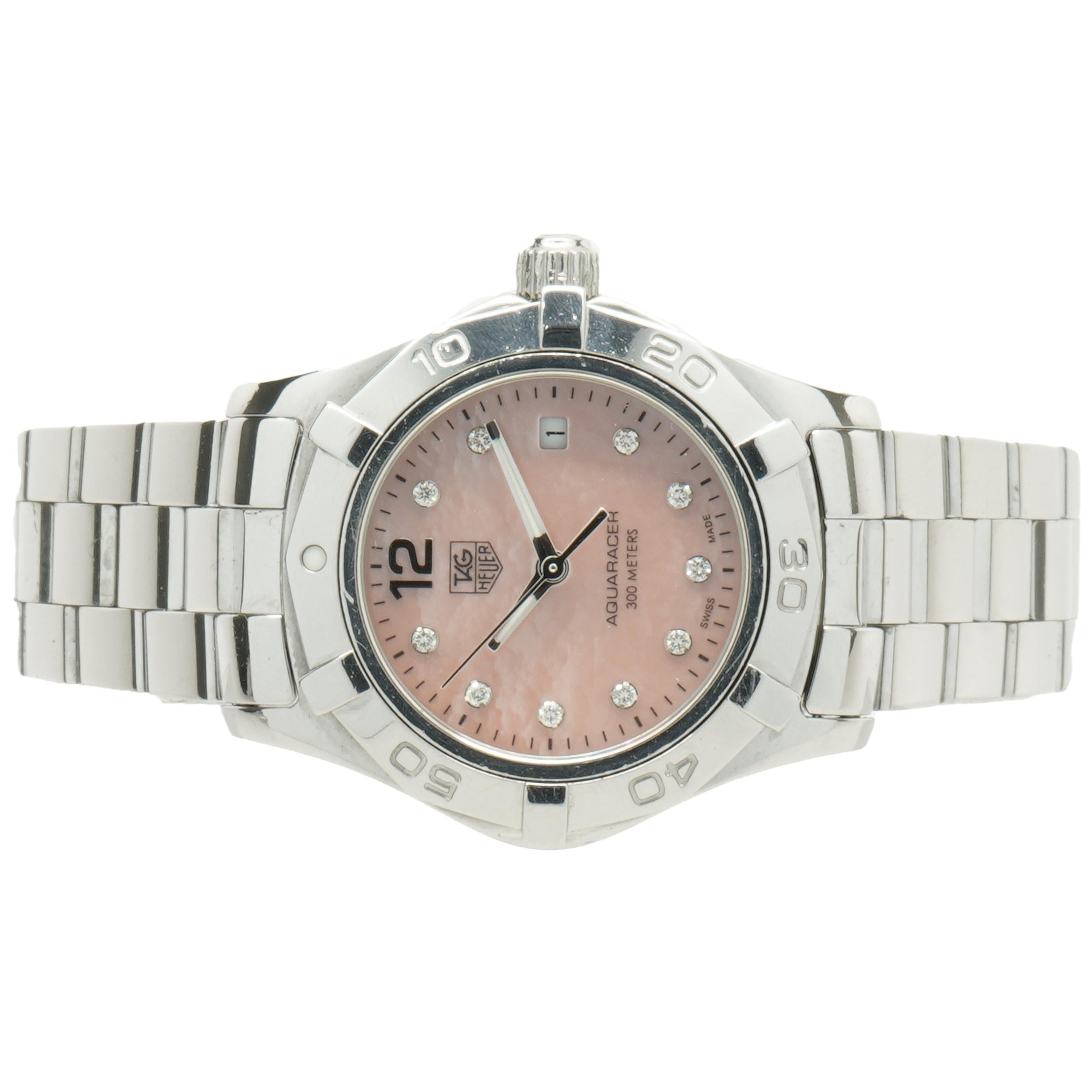 Movement: quartz
Function: hours, minuets, seconds, date
Case: 27mm stainless steel case,  timing bezel
Dial: pink mother of pearl, diamond markers
Band: stainless steel bracelet, integrated clasp
Serial#: RWX8xxx
Reference#: WAF141A

Complete with