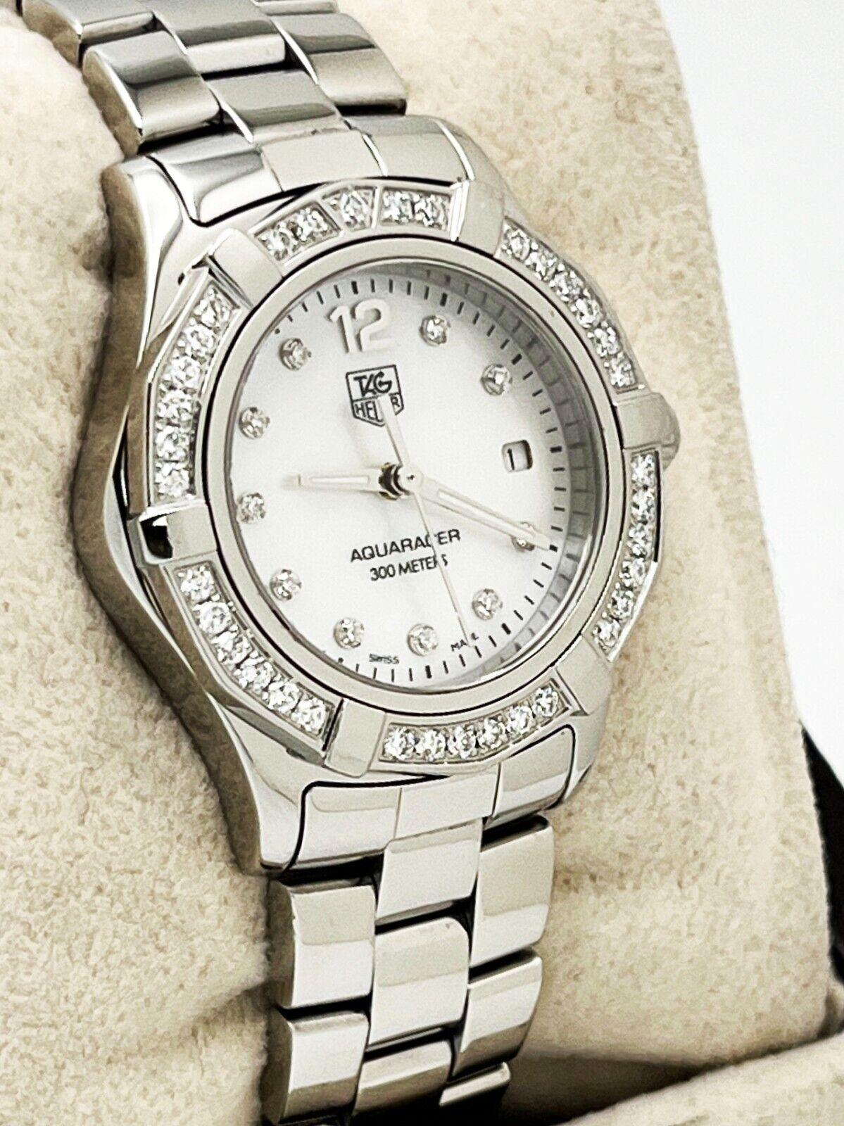 Style Number: WAF1416

 

Model: Ladies Aquaracer

 

Case Material: Stainless Steel

 

Band: Stainless Steel

 

Bezel: Diamond Bezel

 

Dial: Mother of Pearl Diamond Dial

 

Face: Sapphire Crystal

 

Case Size: 27mm

 

Includes: 

-Elegant