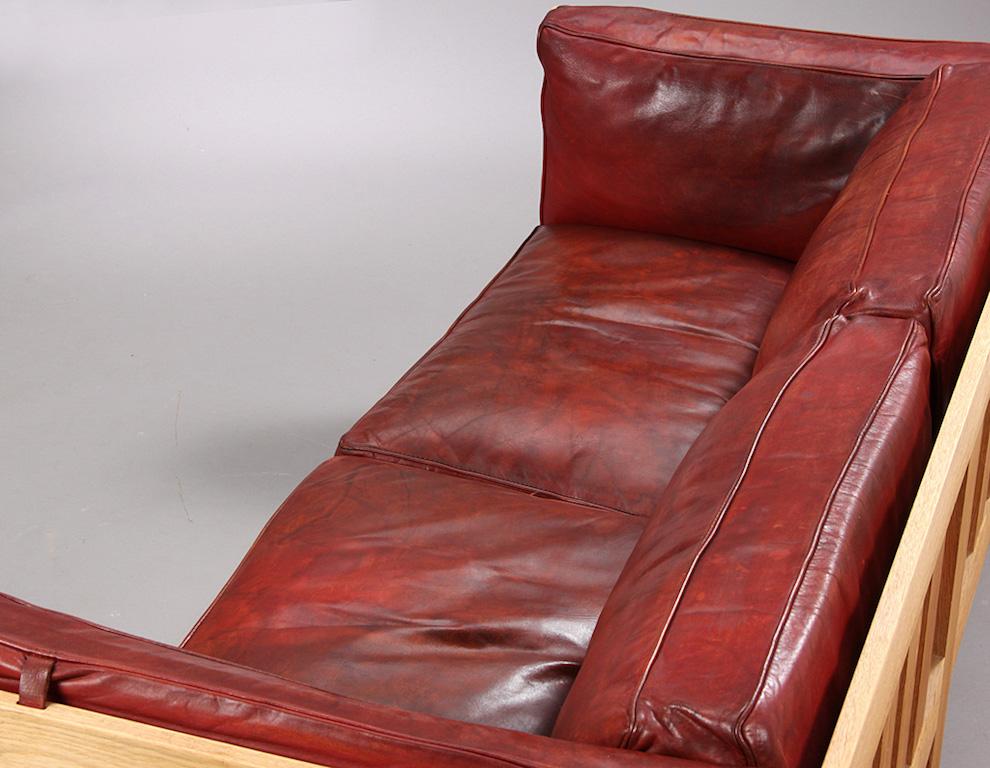 Tage Poulsen Sofa and Chair in Red Leather and Oak Frame In Good Condition For Sale In Vejle, DK