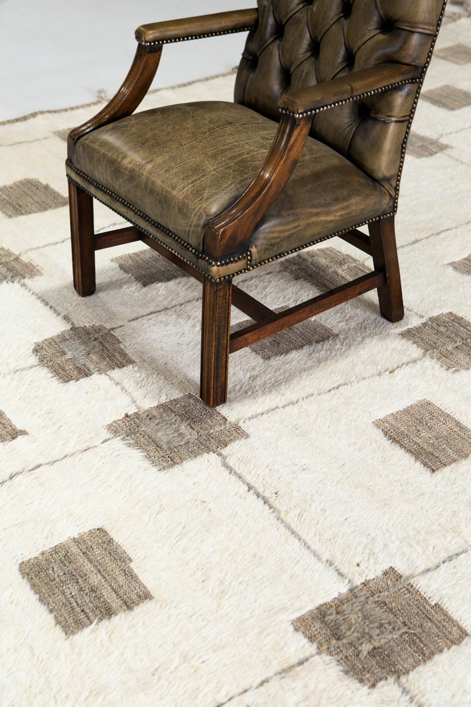 Taghazout' rug is a handwoven wool piece inspired by vintage Scandinavian design elements and recreated for the modern design world. The rug's shag balance and embossed designs bring a unique and playful essence. This collection, 'Kust' also meaning