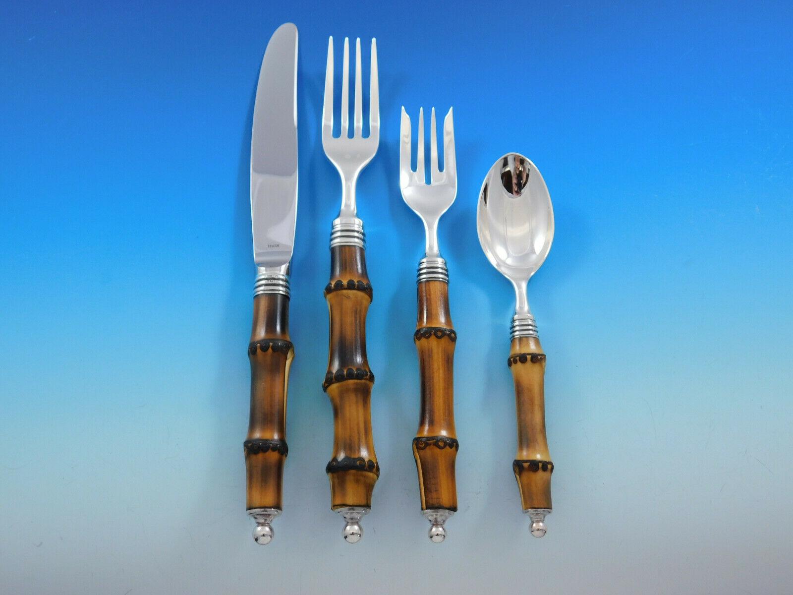Superb Tahiti by Buccellati Italy sterling silver and bamboo handle flatware set, 63 pieces. This set includes:

12 dinner knives with stainless blades, 9 3/4