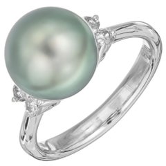 Anello con perla nera di Tahiti dei mari del sud coltivata e diamante in platino