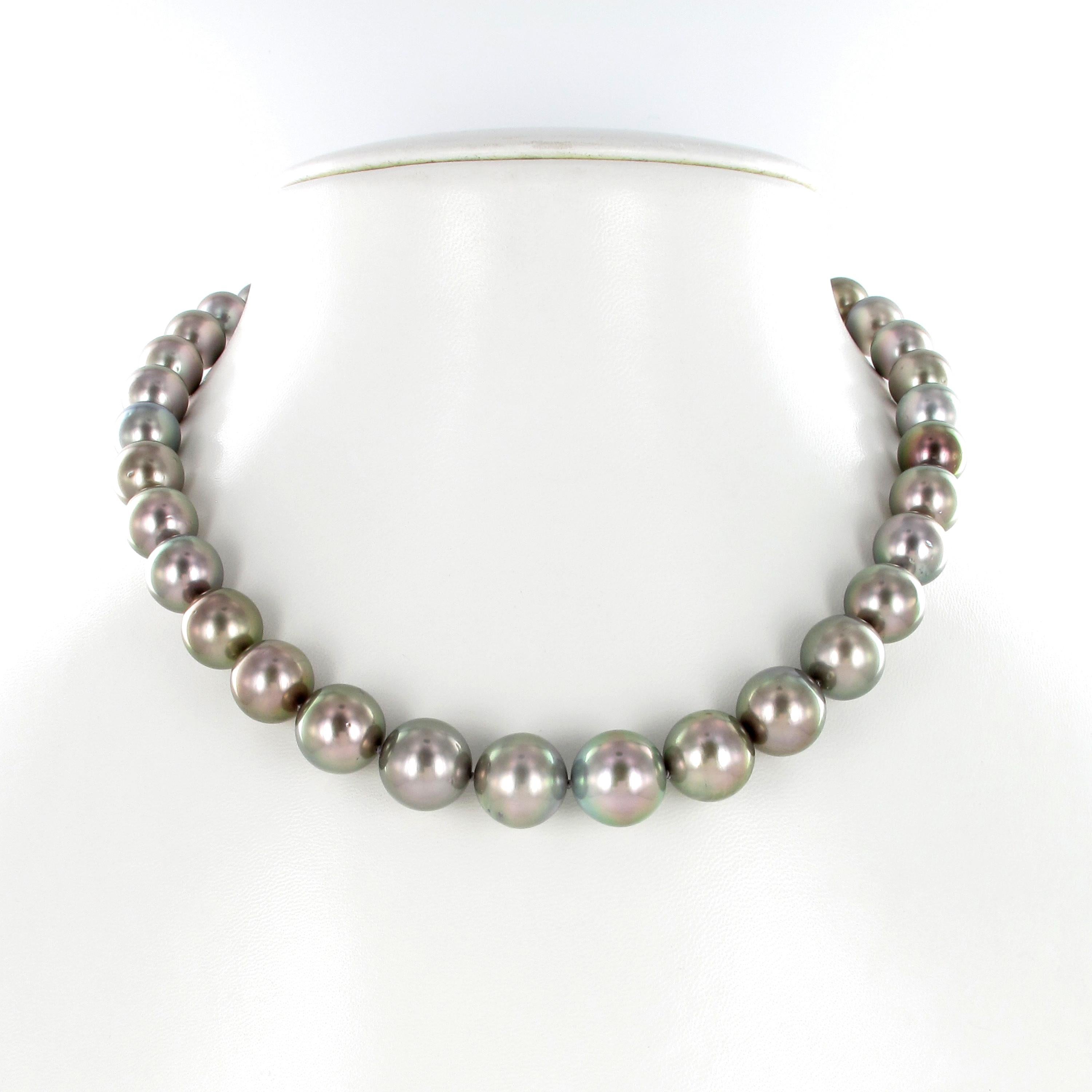 This strand consists of 36 round to slightly near round Tahitian cultured pearls graduating from 10.1 mm to 14.8 mm.
The Body color of the pearls is a medium light gray with beautiful pink overtones. The pearls are of round to near round shapes,