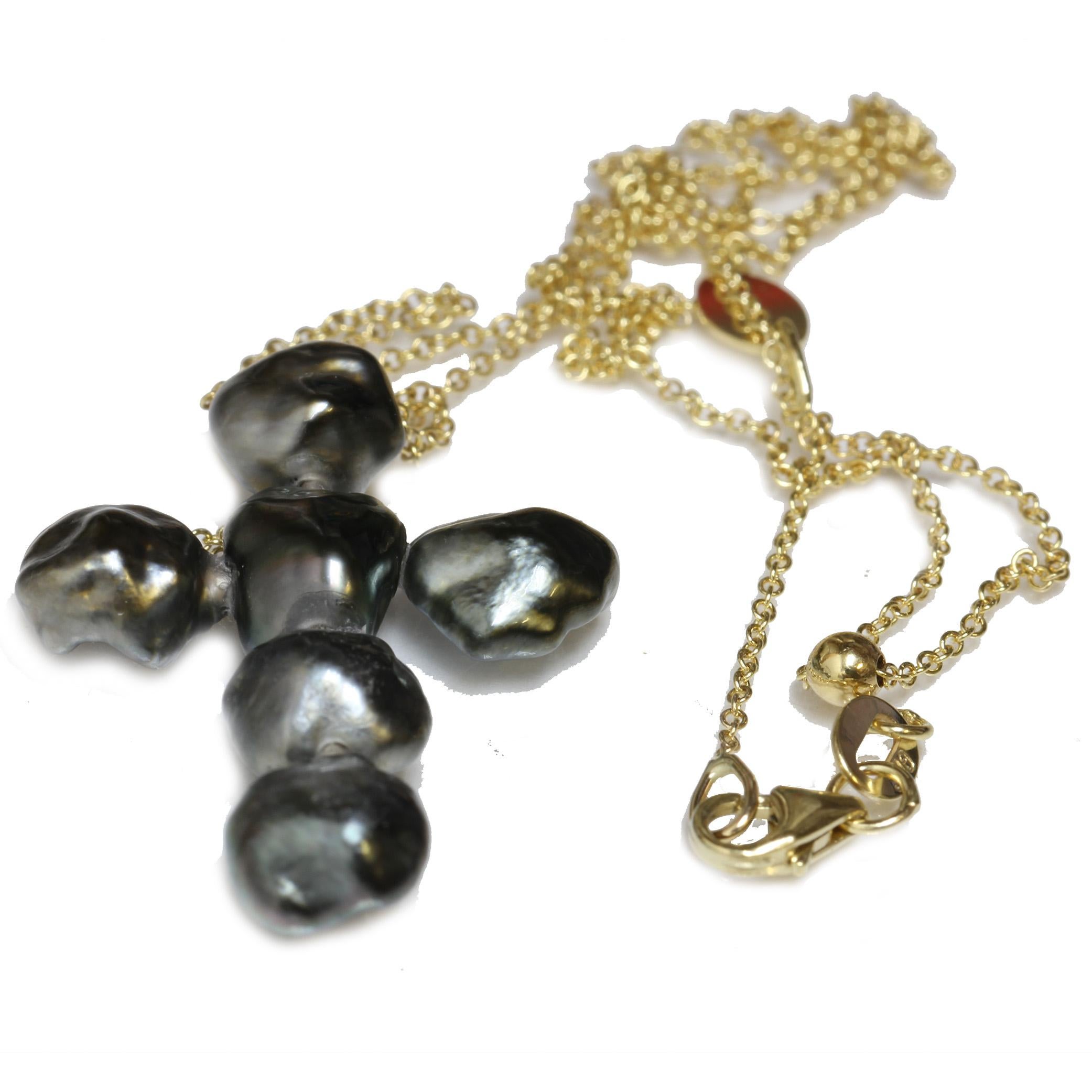 7.0 - 8.0mm  Tahitian keshi pearl diamond cross necklace set in 14kt yellow gold rolo Italian adjustable chain . The pearls is stunning black in color with unique baroque shape. The chain can be easily adjusted by sliding the ball from 18
