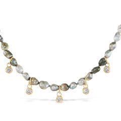 Tahitian keshi pearl strand with 0.59 carat diamond charms Hi June Parker